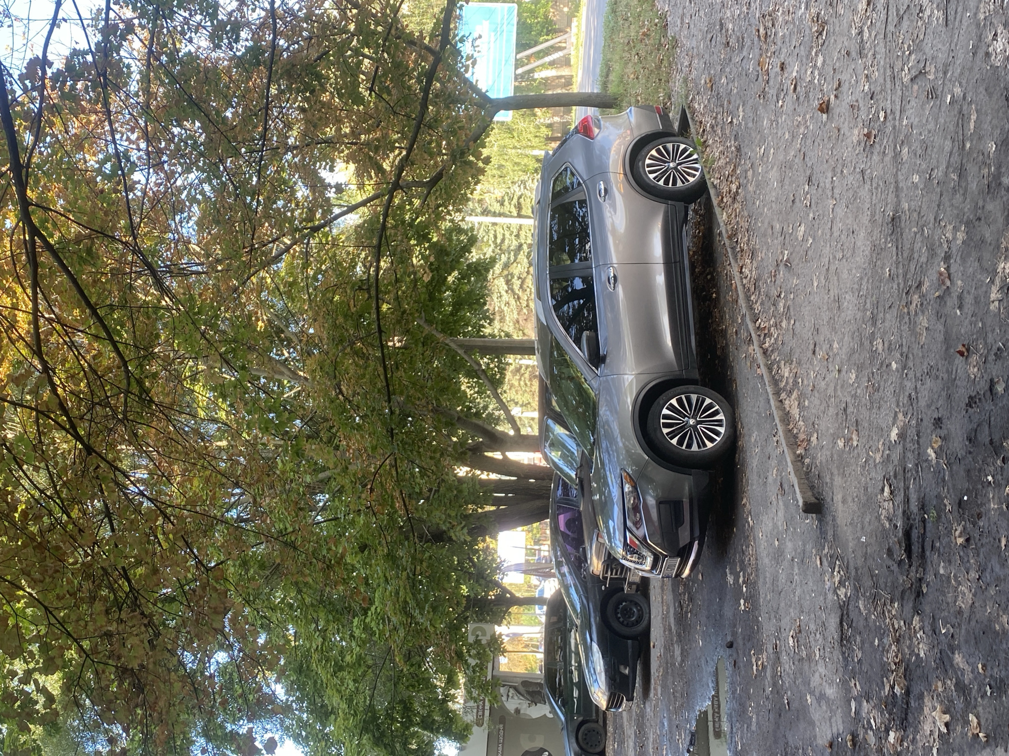 Everyday street life in central Poltava on a summer afternoon