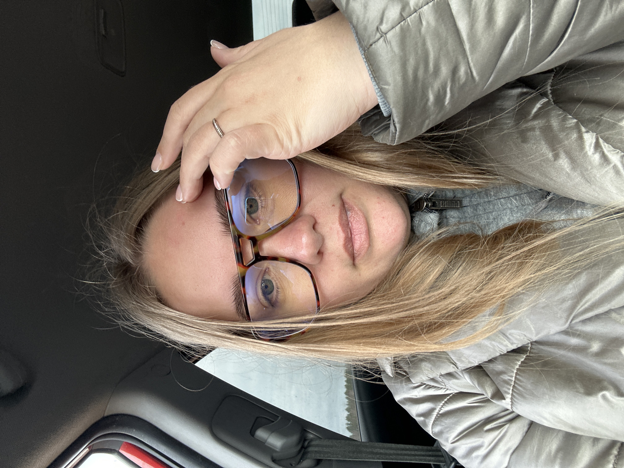 Person takes selfie in vehicle in Ural'skoe, Russia