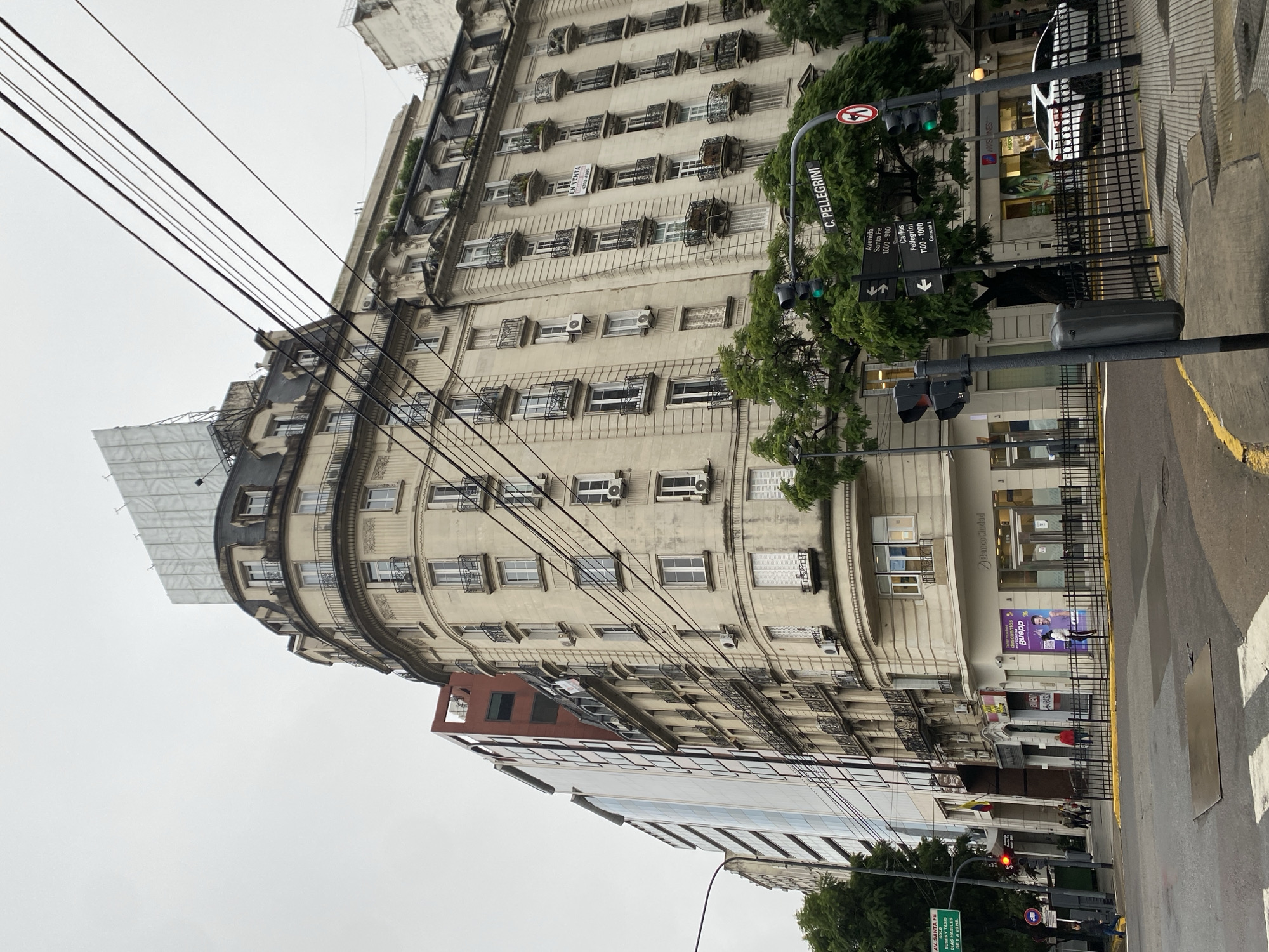 Corner building with balconies observed in Buenos Aires street