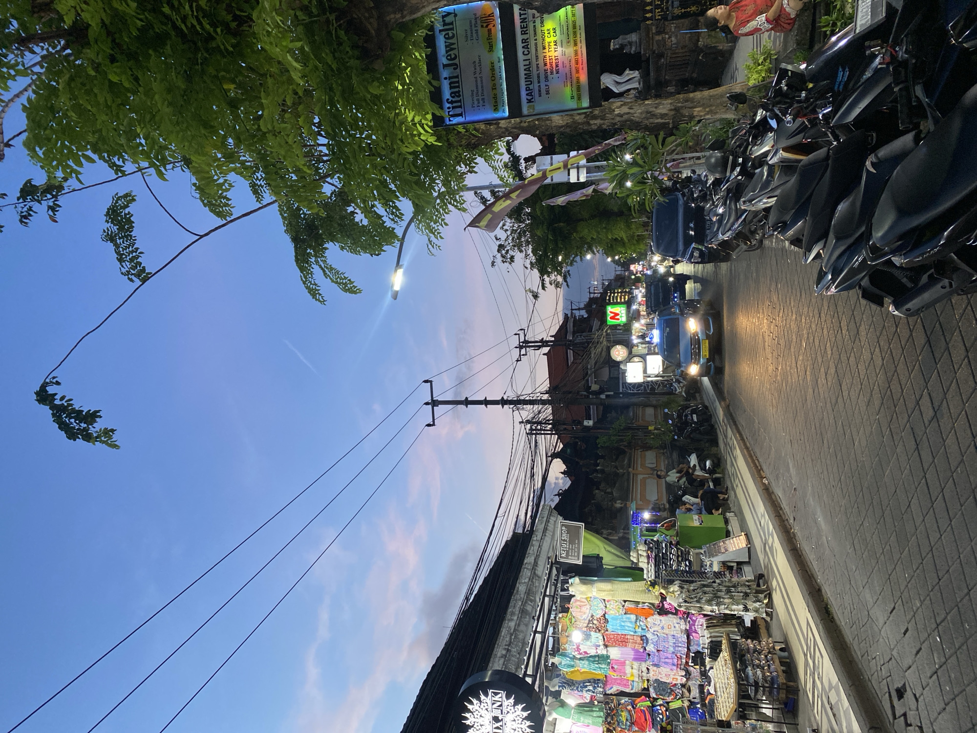 Daily commercial life documented across Kuta business district