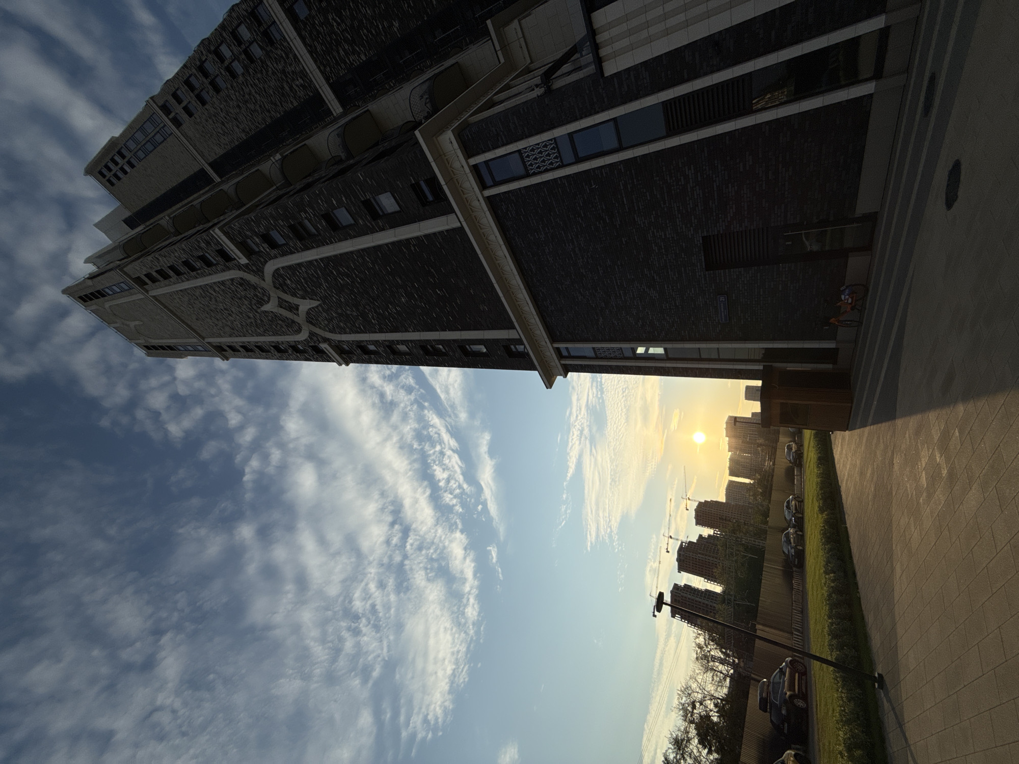 Urban journey through modern cityscape documented during sunset hours