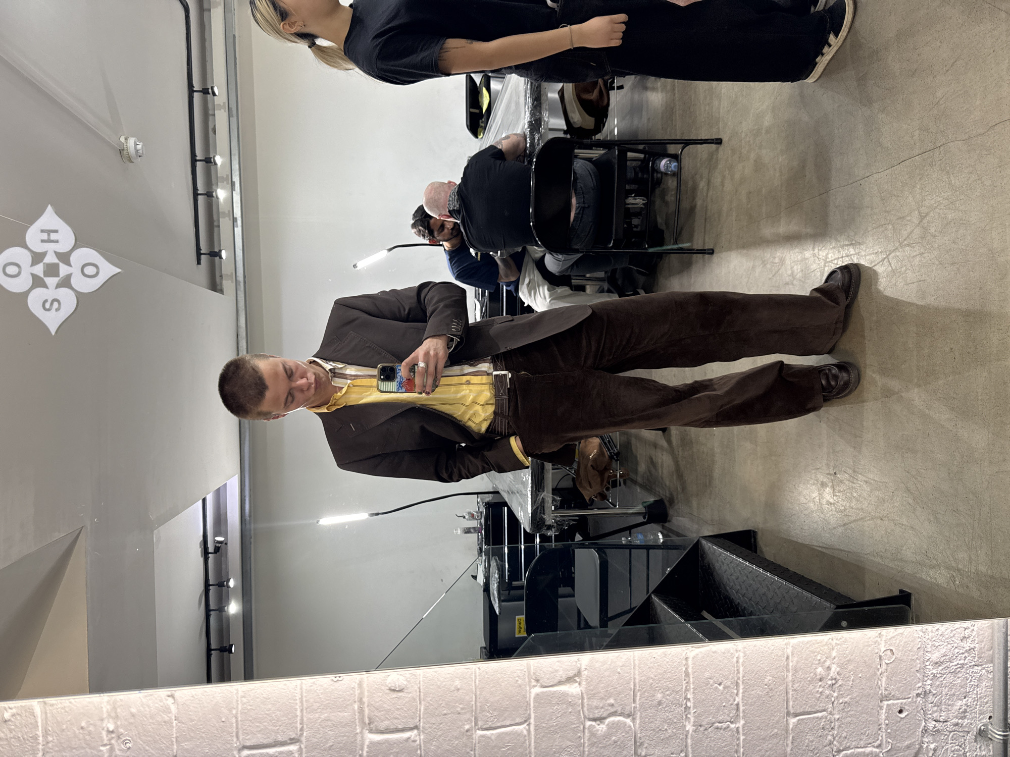 Photo shoot production activities documented in London commercial space