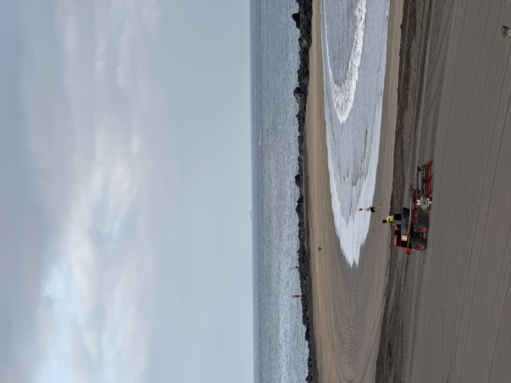 Beach tractor grooming the sand at Costa Adeje