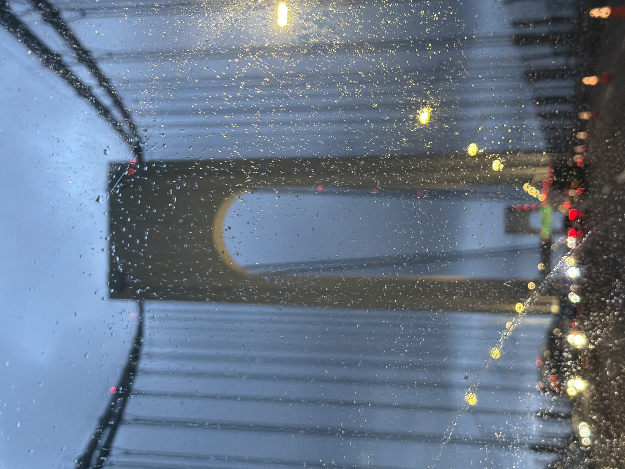 Bridge tower through a rainy windshield, New York