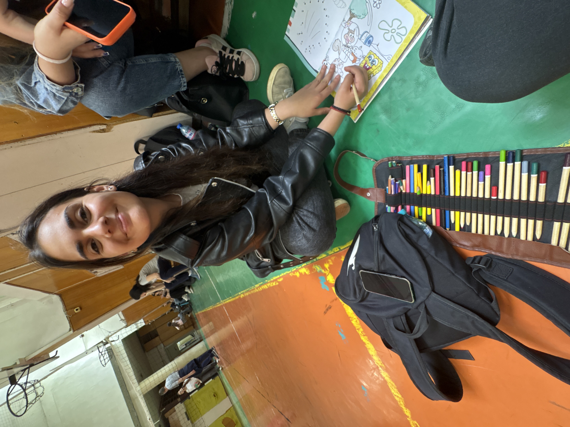 Student colors SpongeBob books, studies Spanish in Burgas classroom
