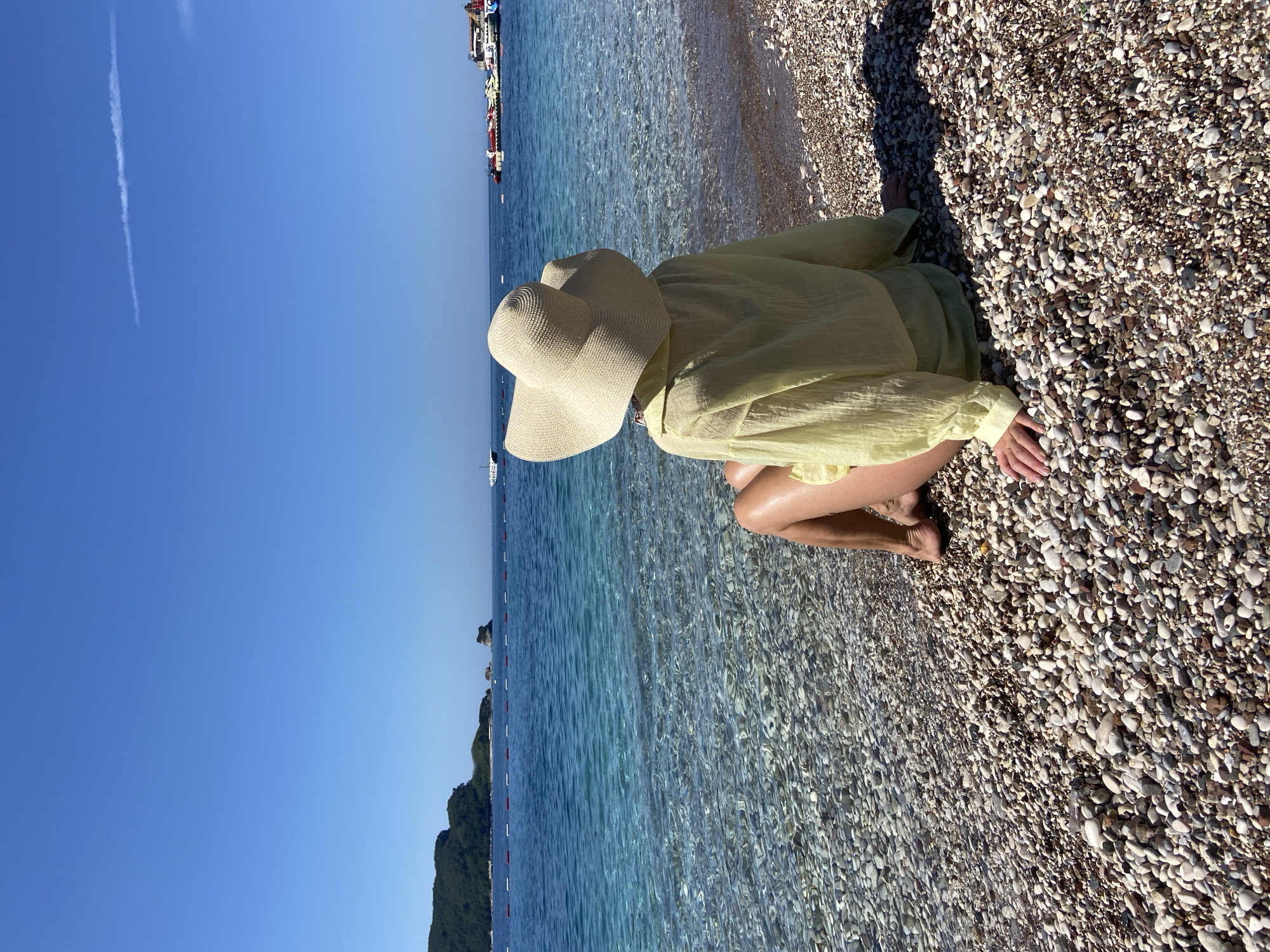 Person enjoys morning moment on Budva beach
