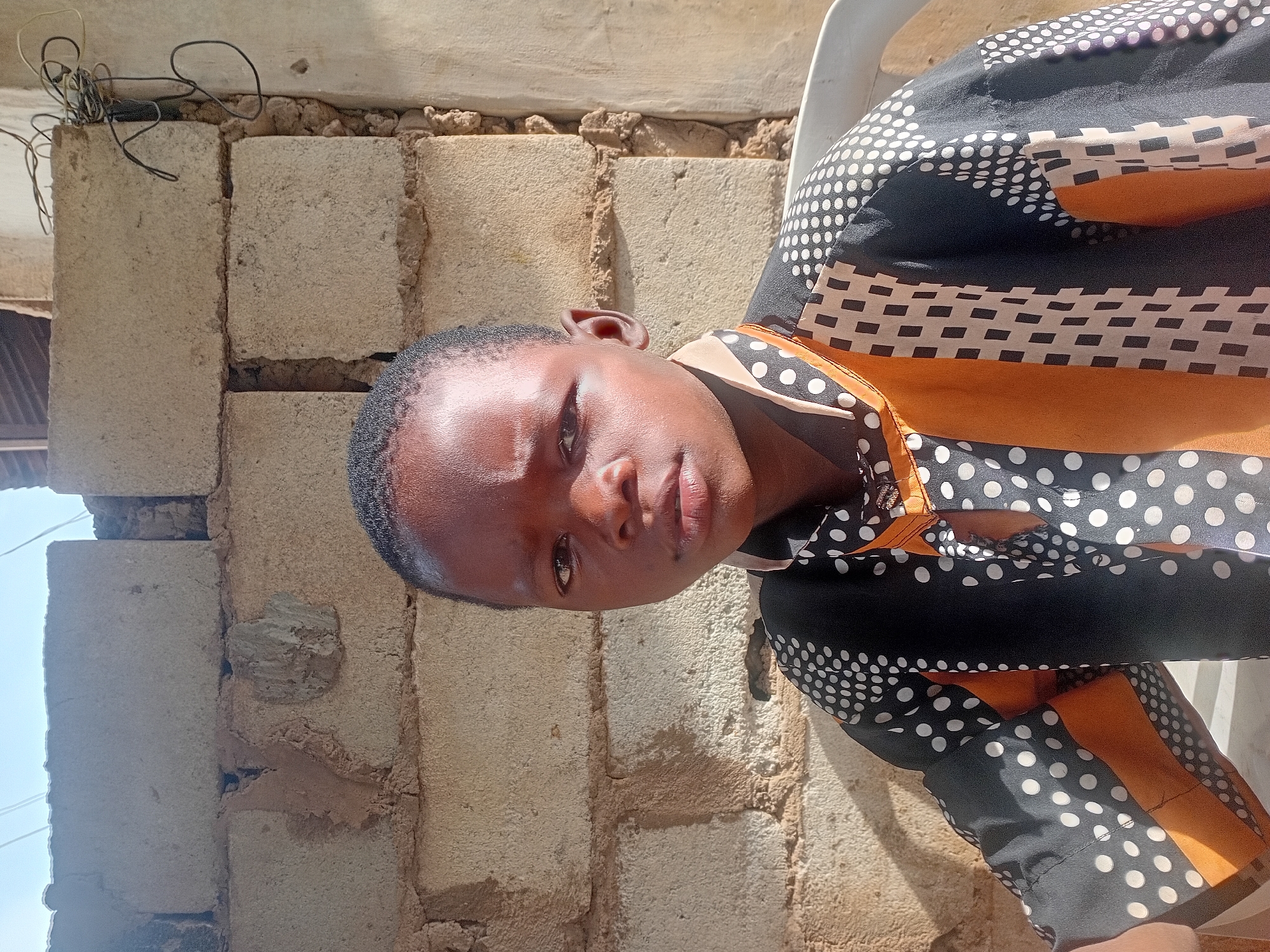 Portrait captured of individual in patterned shirt, Ikorodu Nigeria