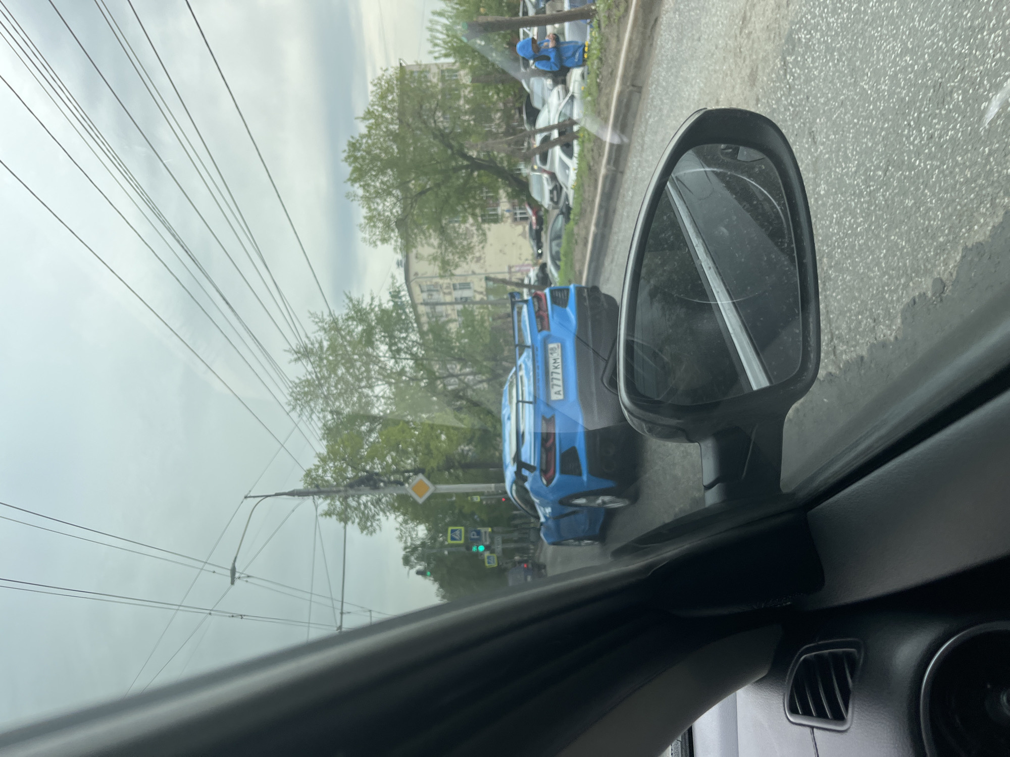 Blue Corvette spotted in traffic near monument in Izhevsk