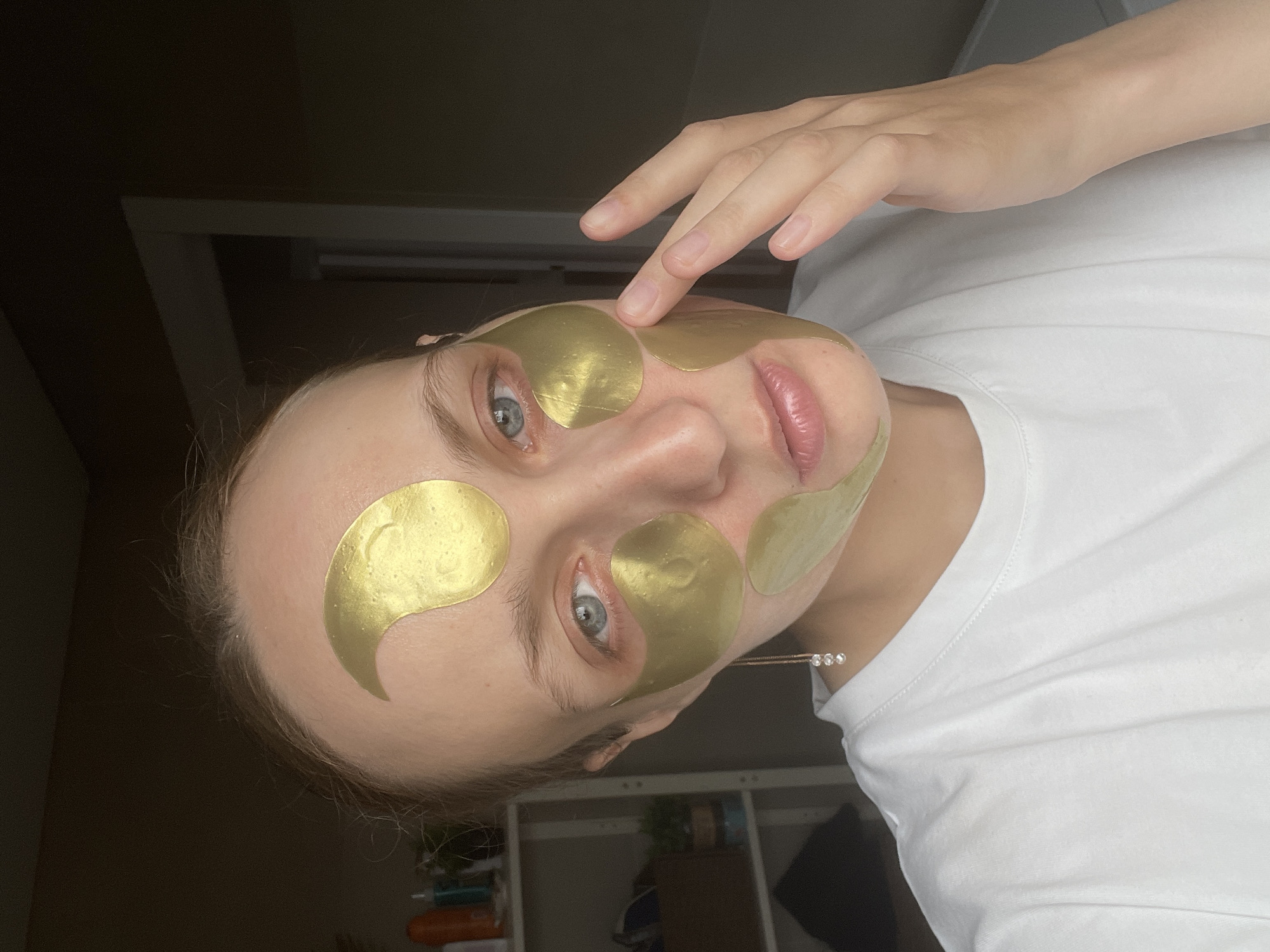 Morning skincare routine documented in Подшивалово with gold patches
