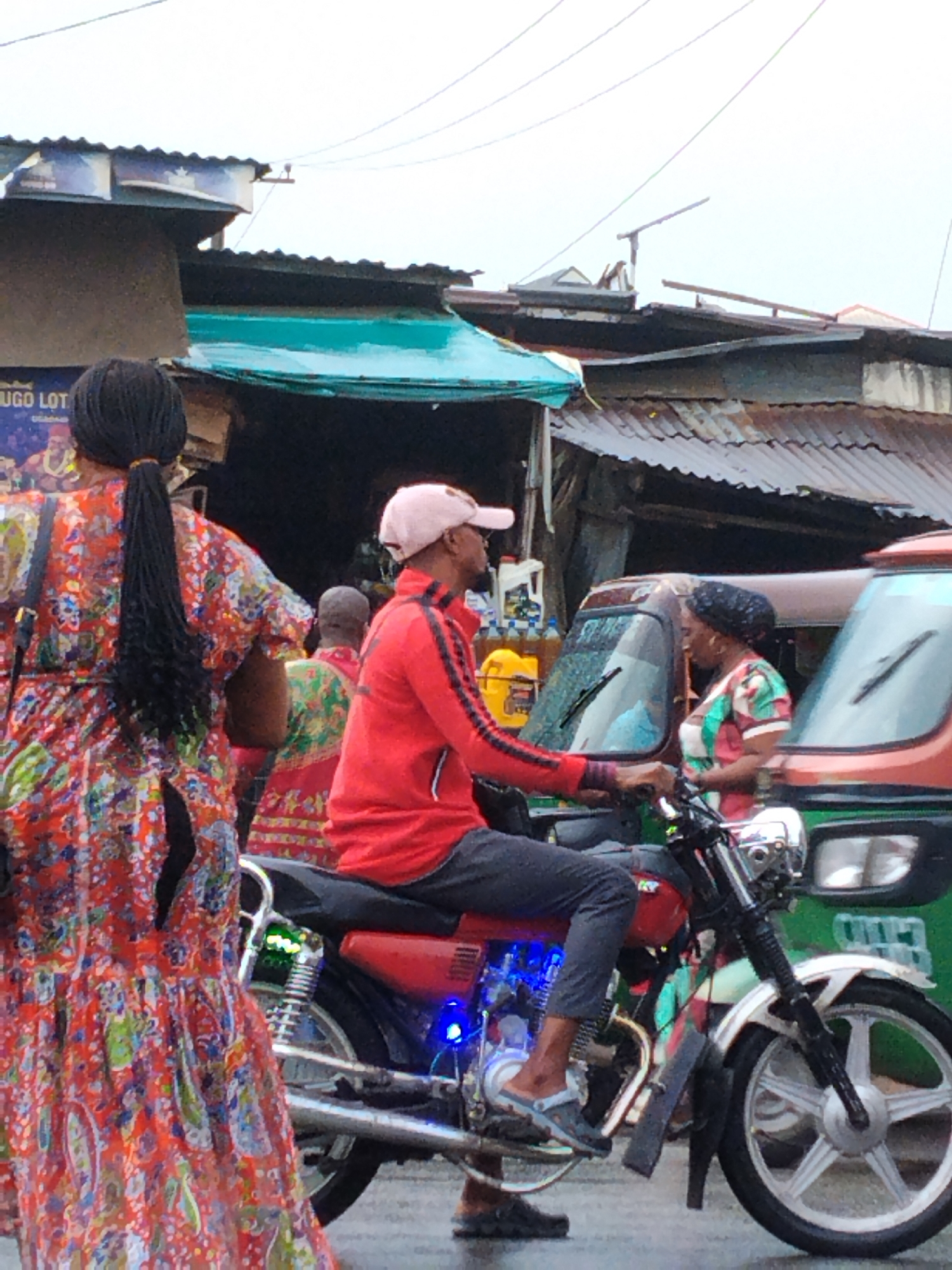 Rainy afternoon street life documented in Aba, Umuode Nigeria