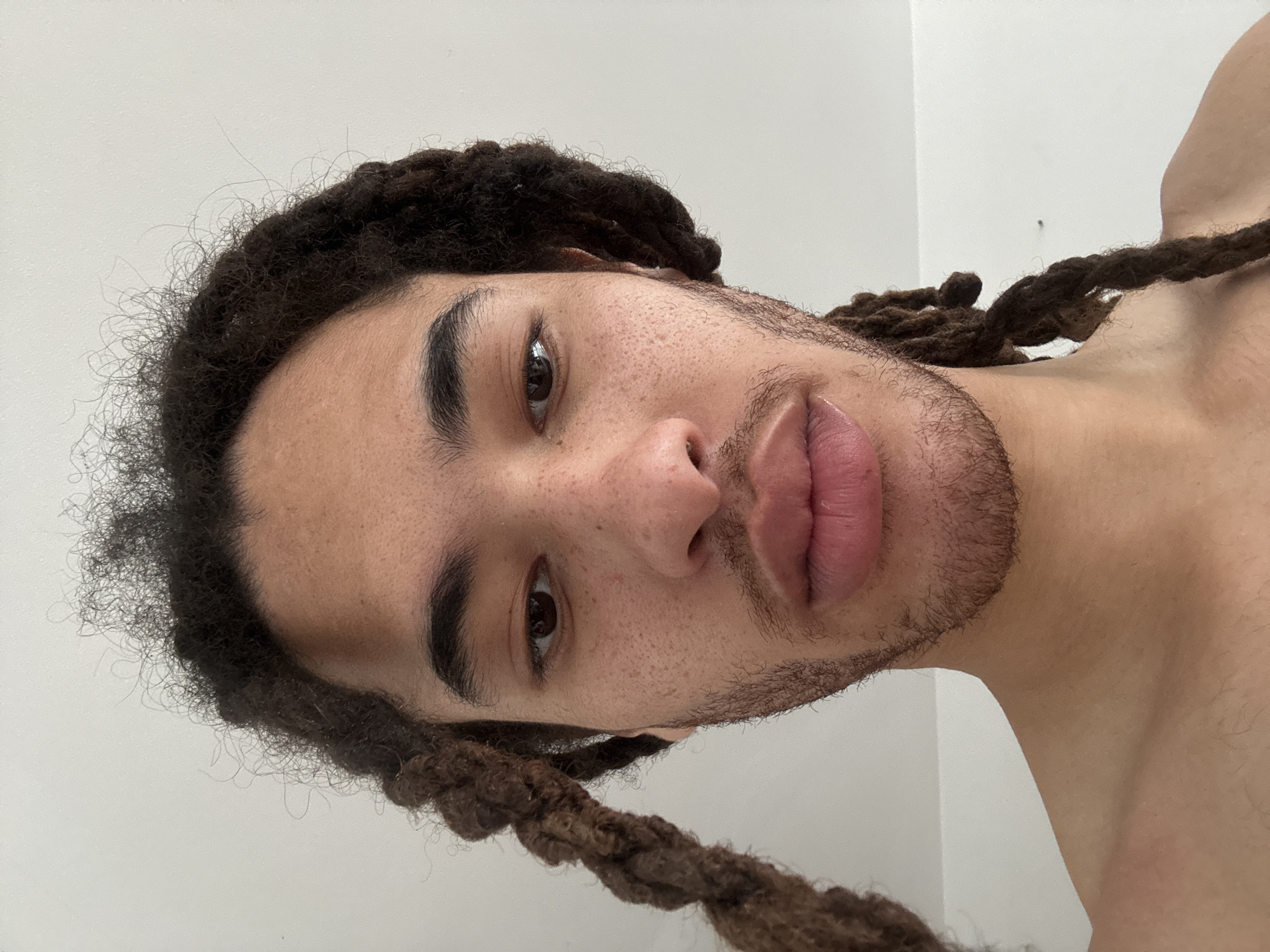 Individual with dreadlocks photographed in close-up portraits, Paris