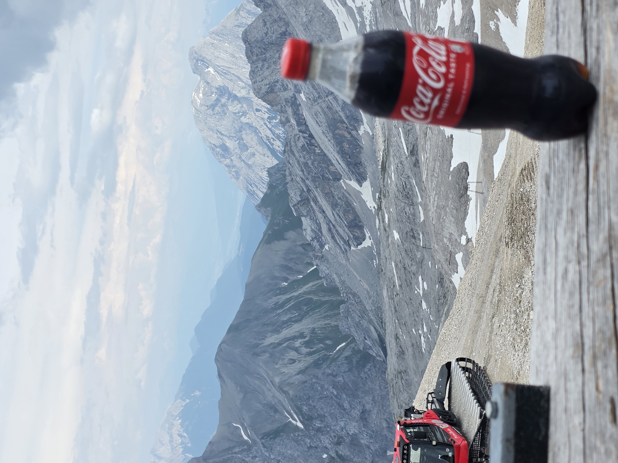 Coca-Cola bottle meets Alpine peaks above Garmisch-Partenkirchen