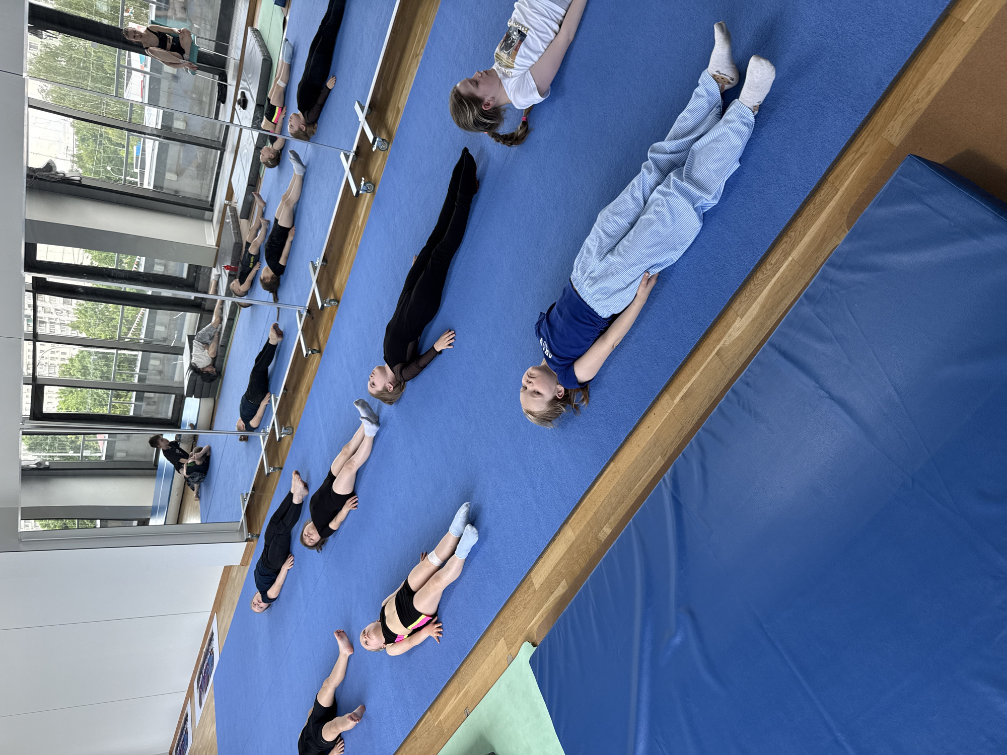 Children's gymnastics training session documented in Khimki studio