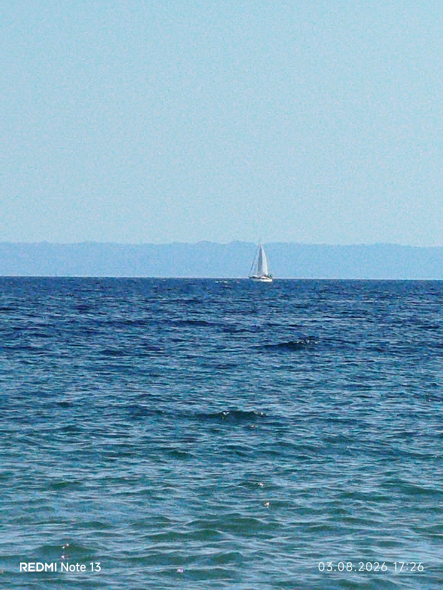 Lazy afternoon on a Sithonia pebble beach, Aegean in view