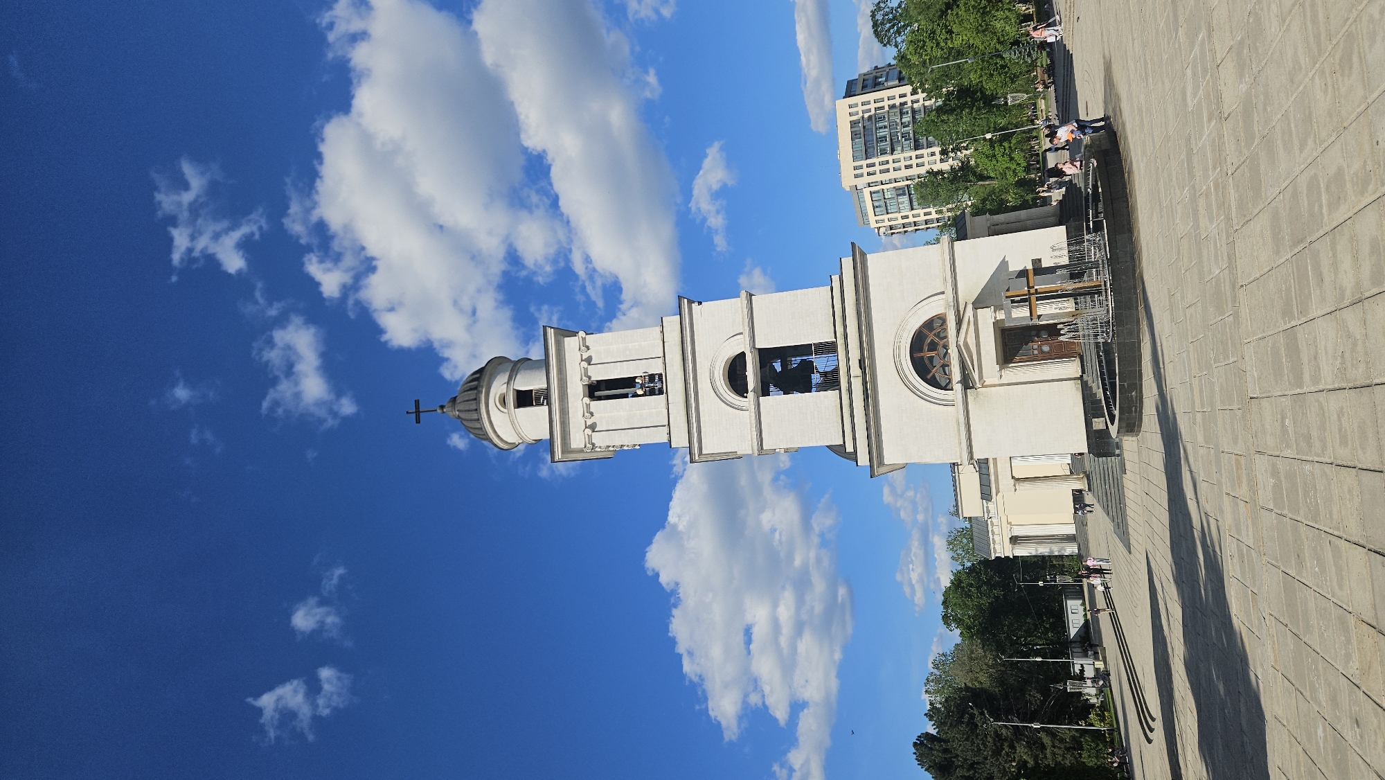 Tourist photographs captured at Chișinău landmarks under clear skies