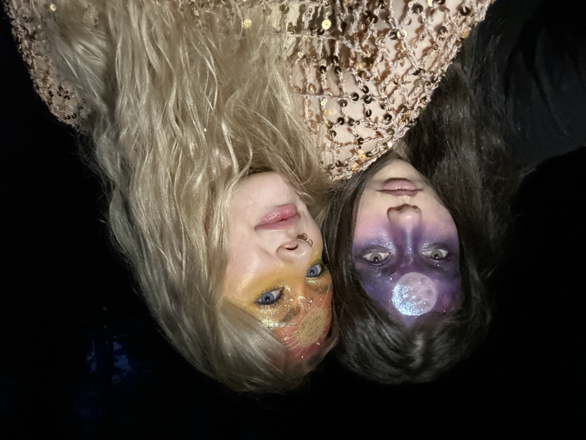 Theatrical makeup scene documented during twilight in Chaikovsky, Russia