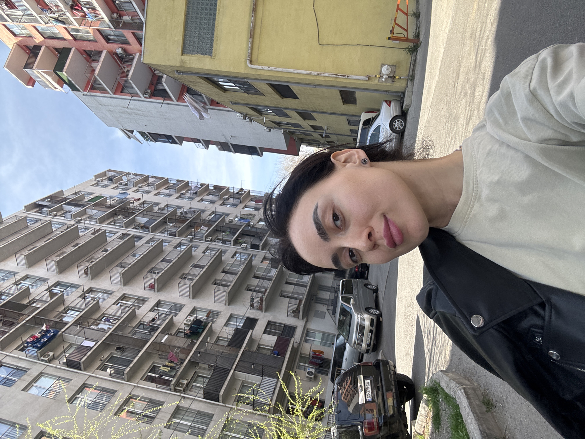 Person documents brief journey through Tbilisi with multiple selfies