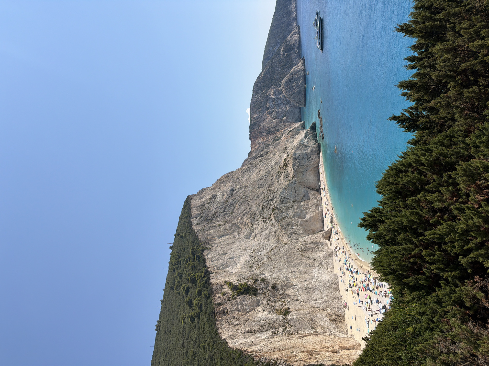 Busy summer day at Egremni Beach, Lefkada, Greece