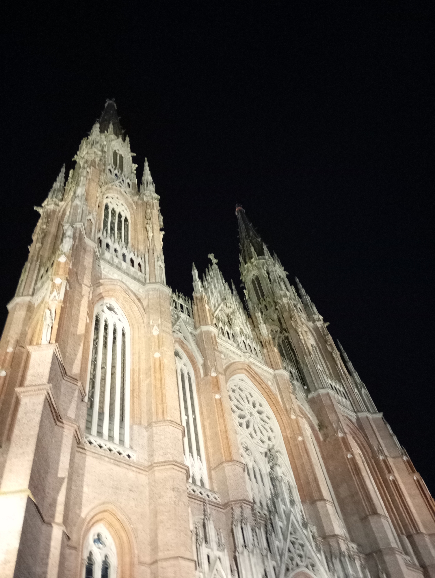 Nighttime walk through La Plata's religious landmarks and streets