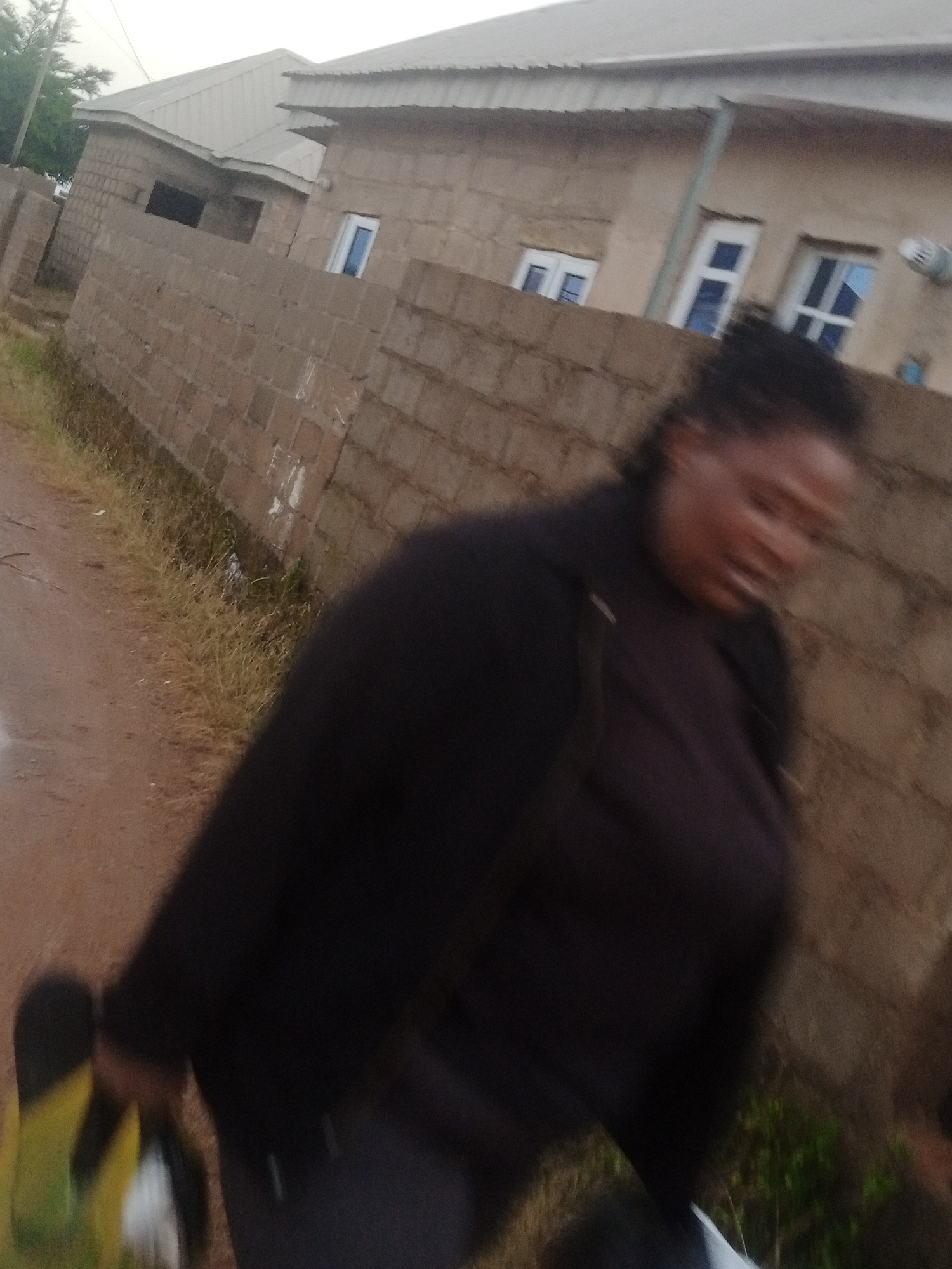 Everyday street activity on wet roads after rain