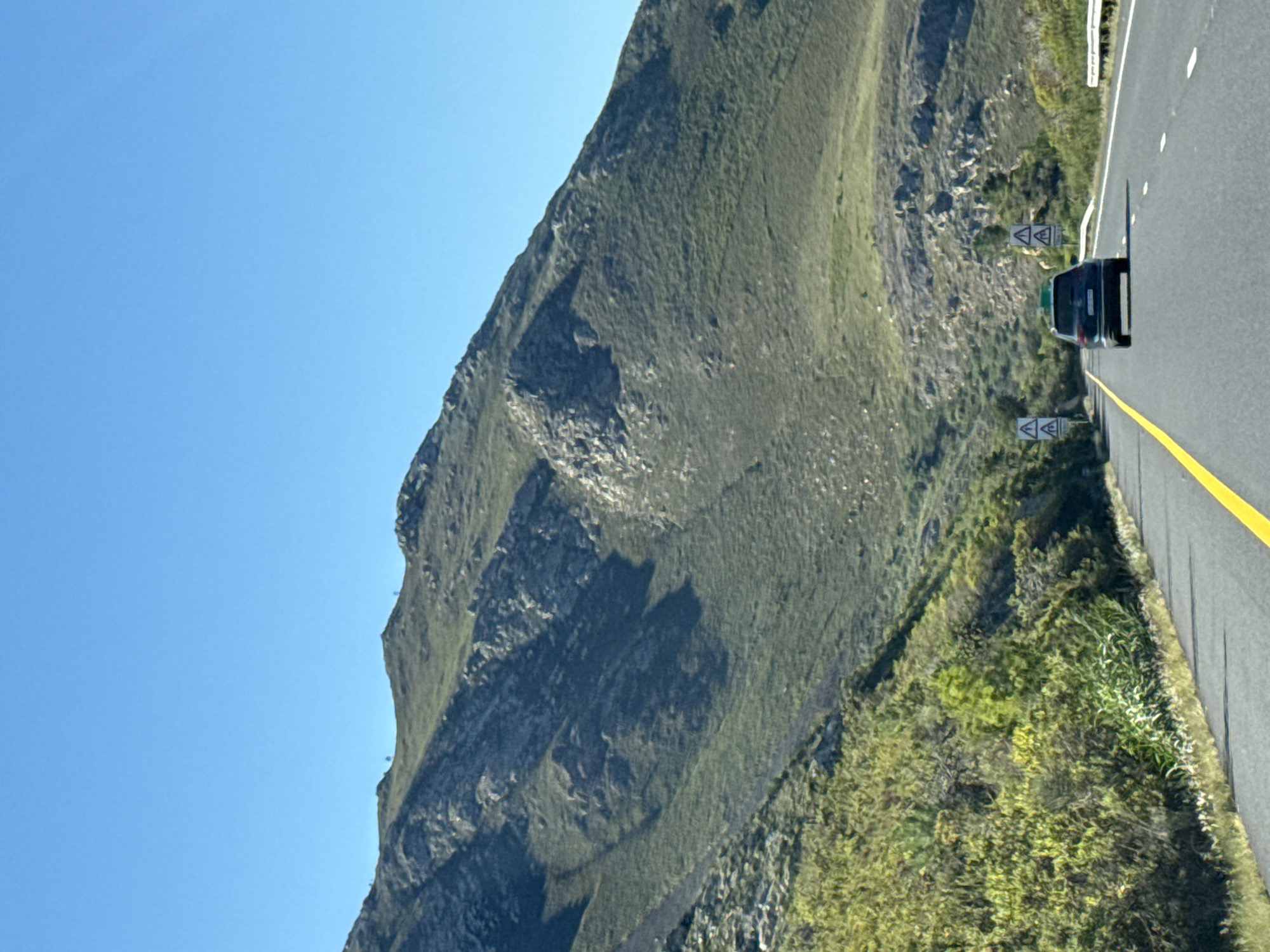 Clear skies over green mountain slopes in Lebanon, South Africa