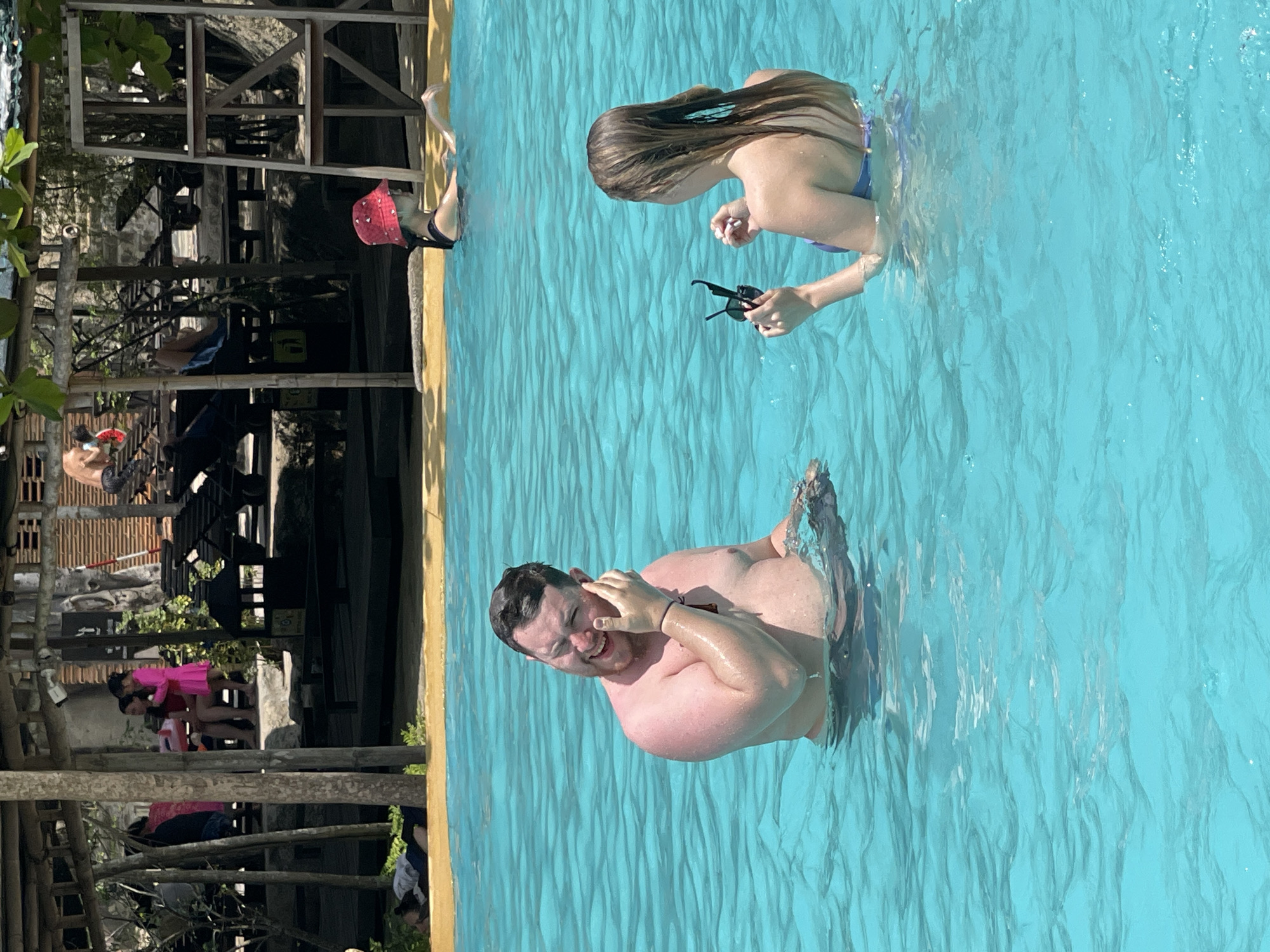 Morning scenes from Nha Trang: poolside couple, blooming heritage trail