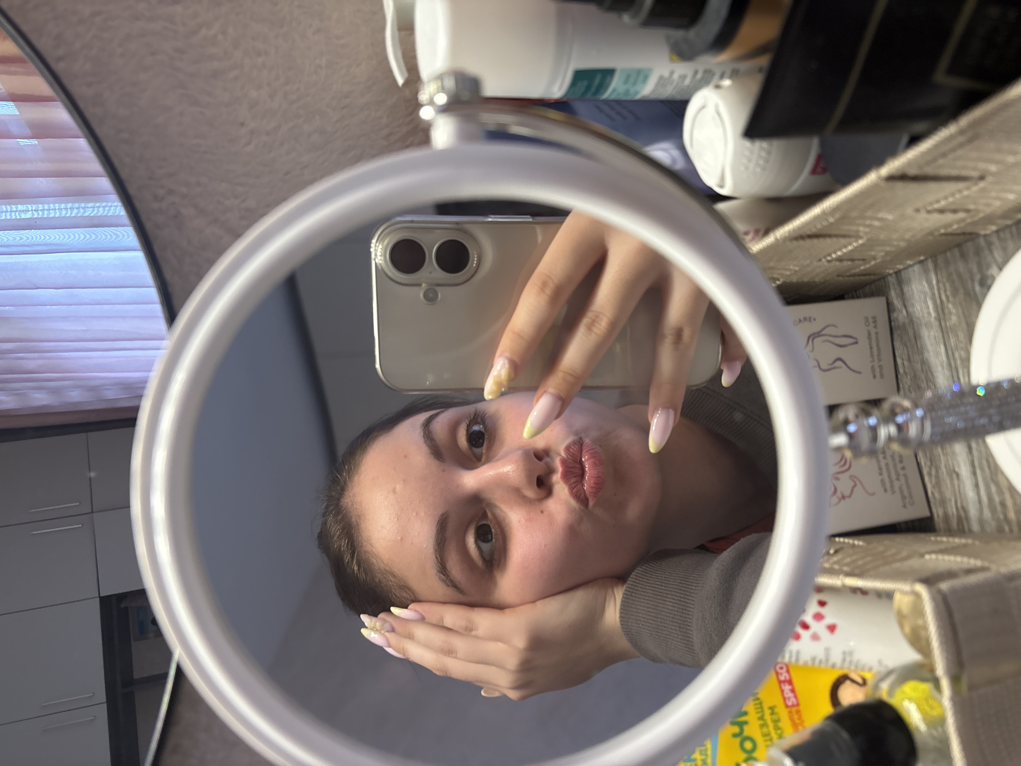 Woman takes mirror selfies in Bulgarovo bedroom