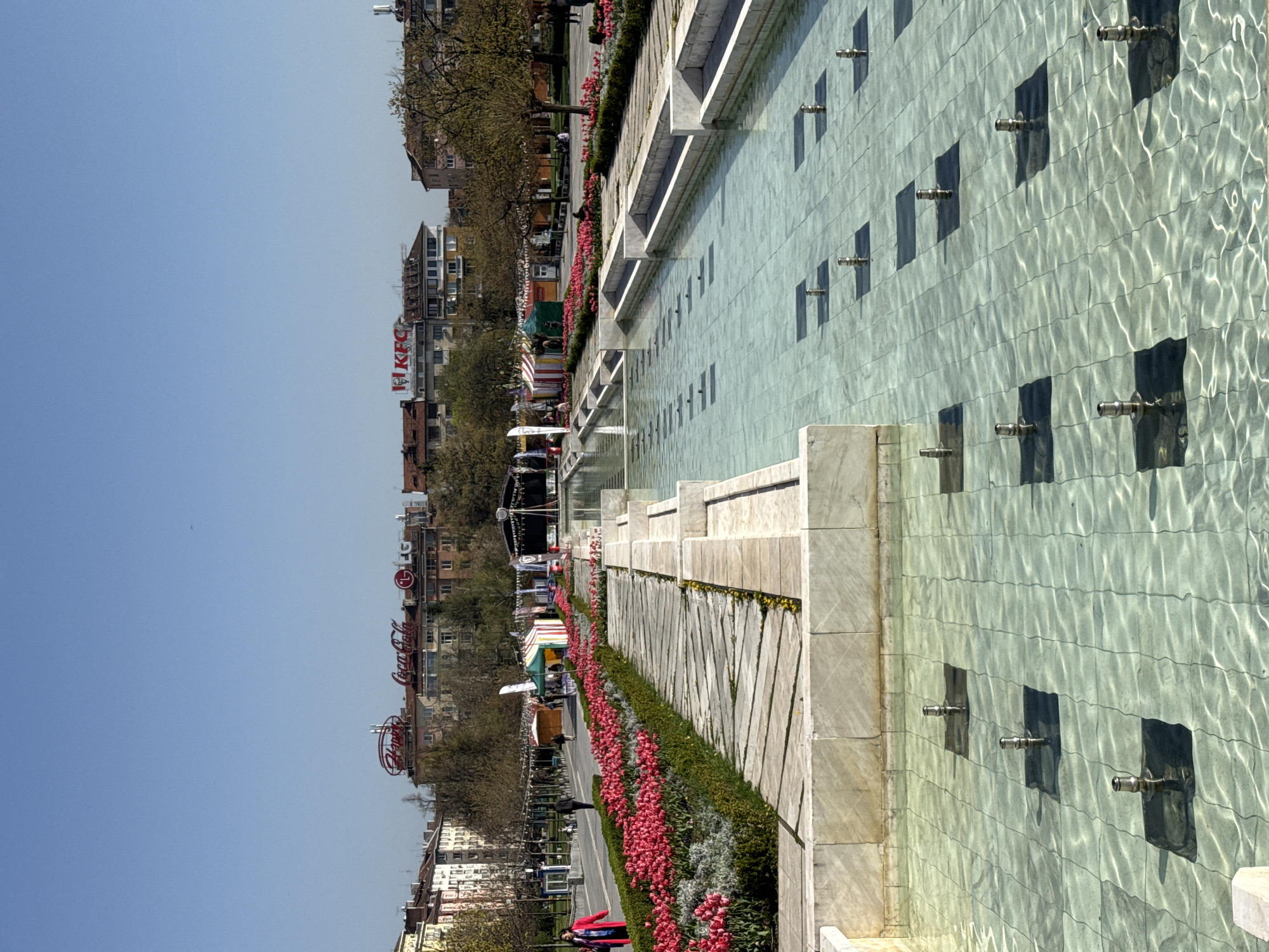 Sunny morning captured at Sofia urban plaza with water feature