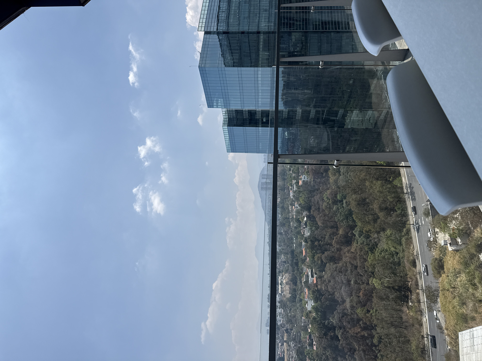 High-rise views captured of Mexico City skyline and mountains