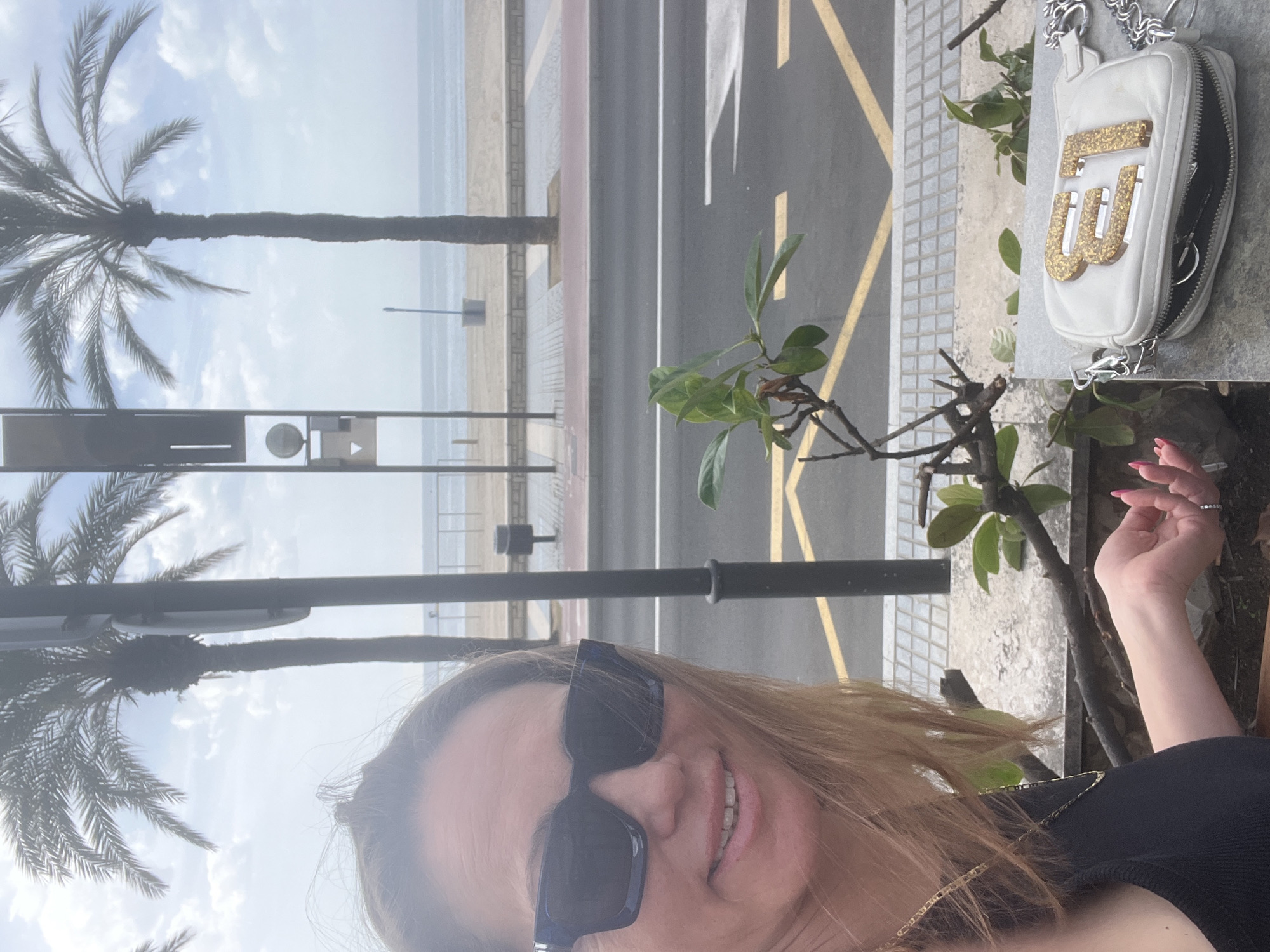 Tourist documents morning stroll through Salou, Spain coastal attractions