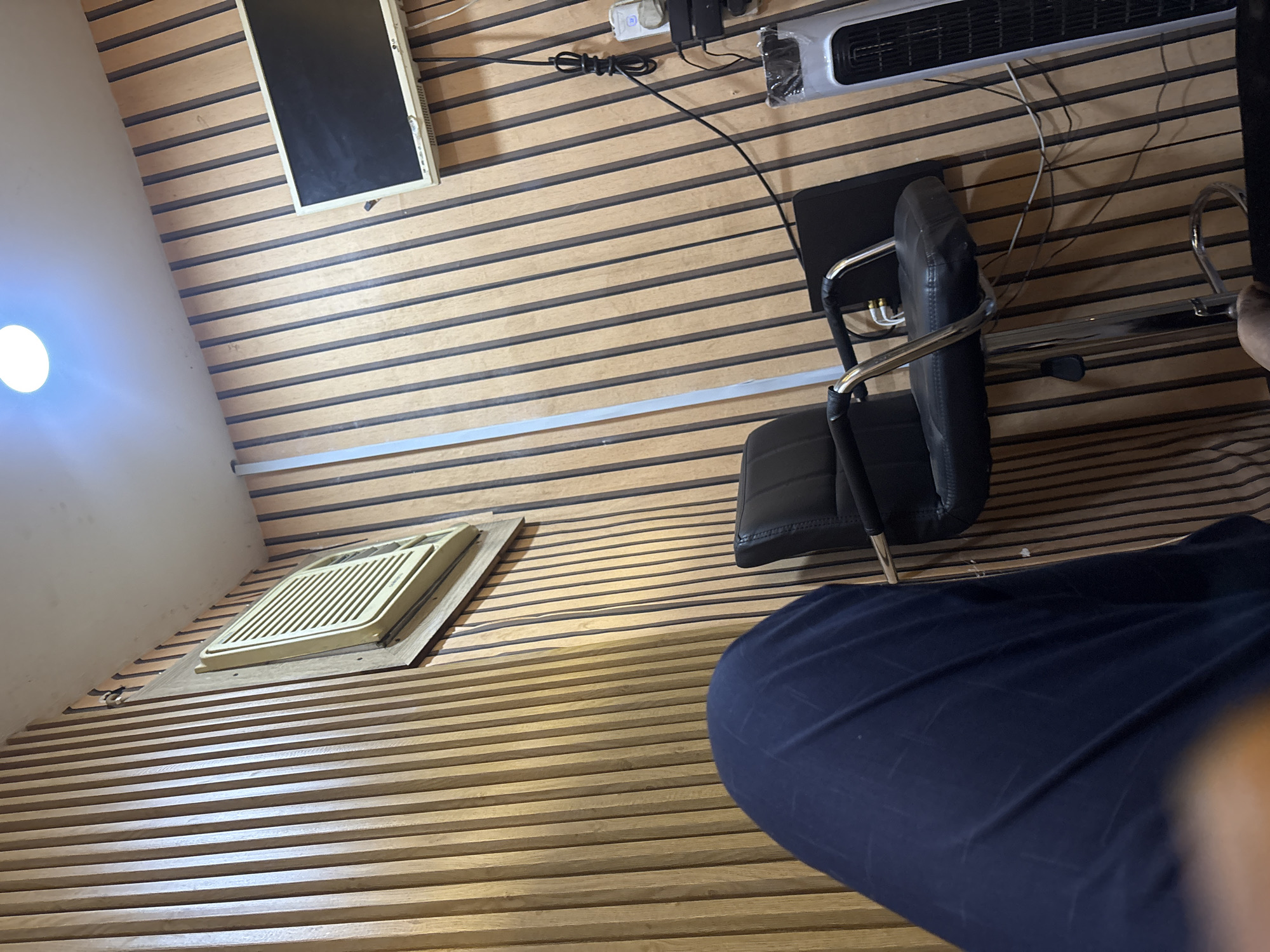 Indoor room with wooden walls documented in Lokoja, Nigeria