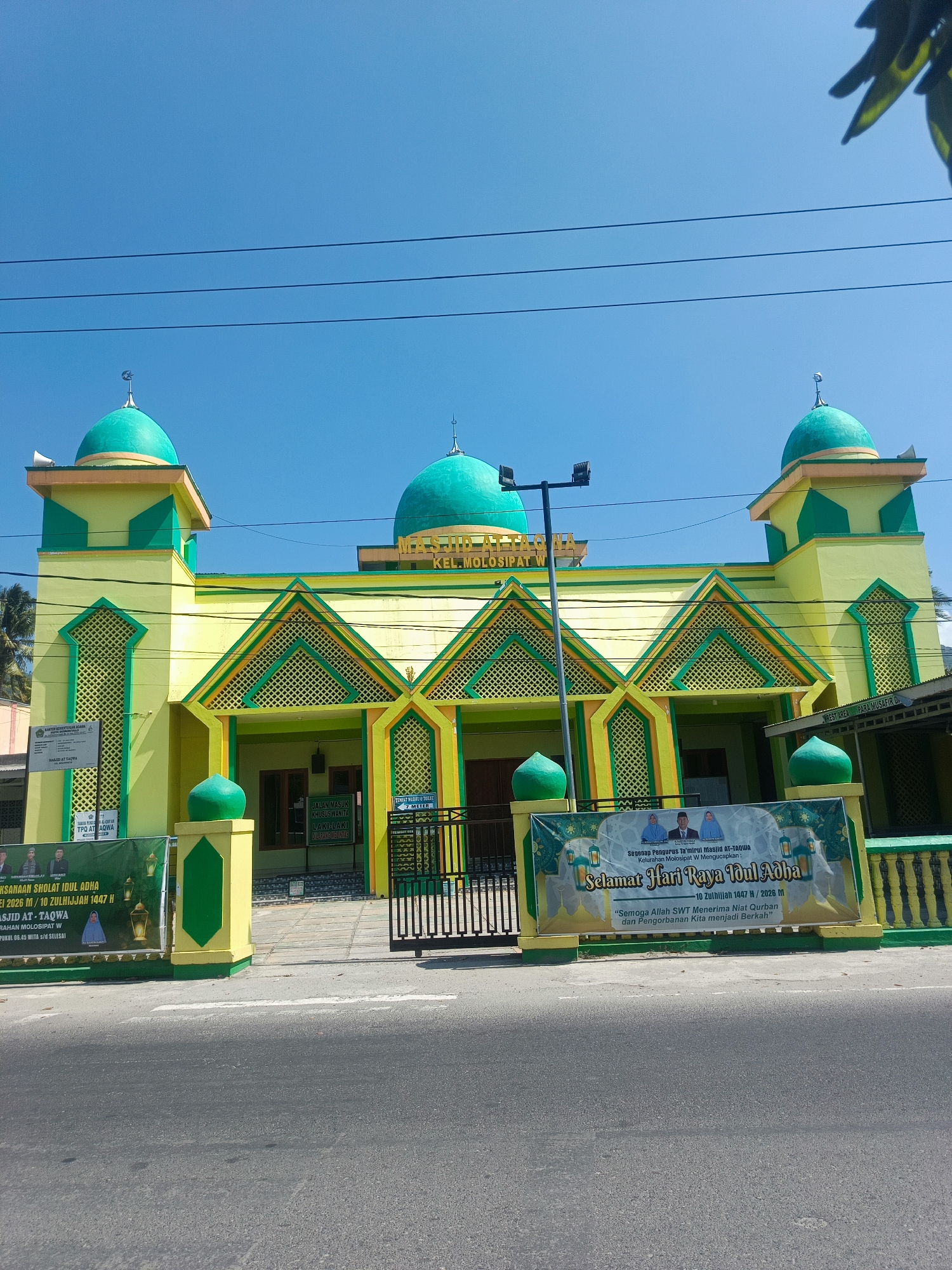 Mosque and tropical greenery in a Gorontalo neighborhood