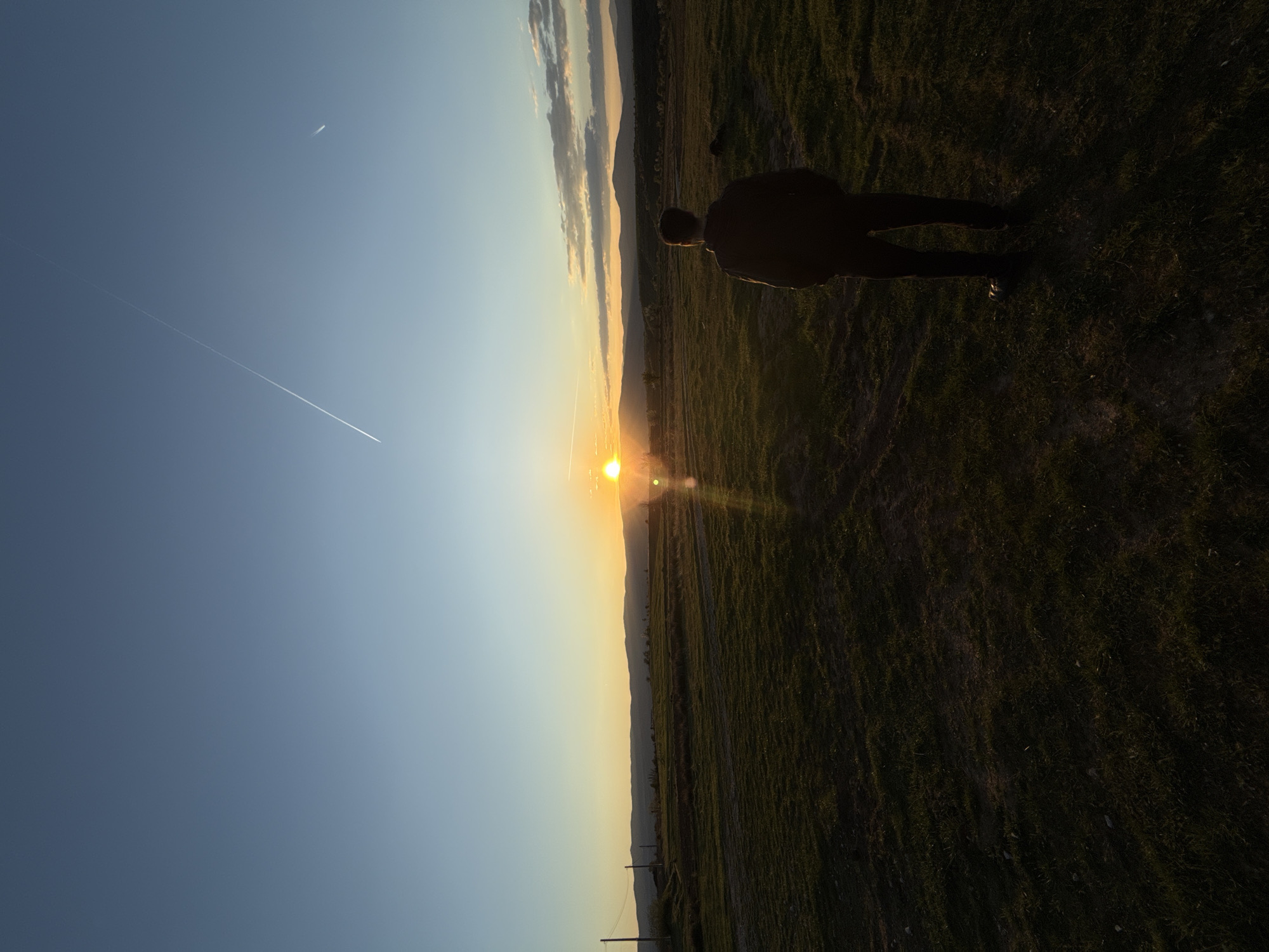 Person enjoys sunset moment in Bulgarian countryside near Blagoevgrad
