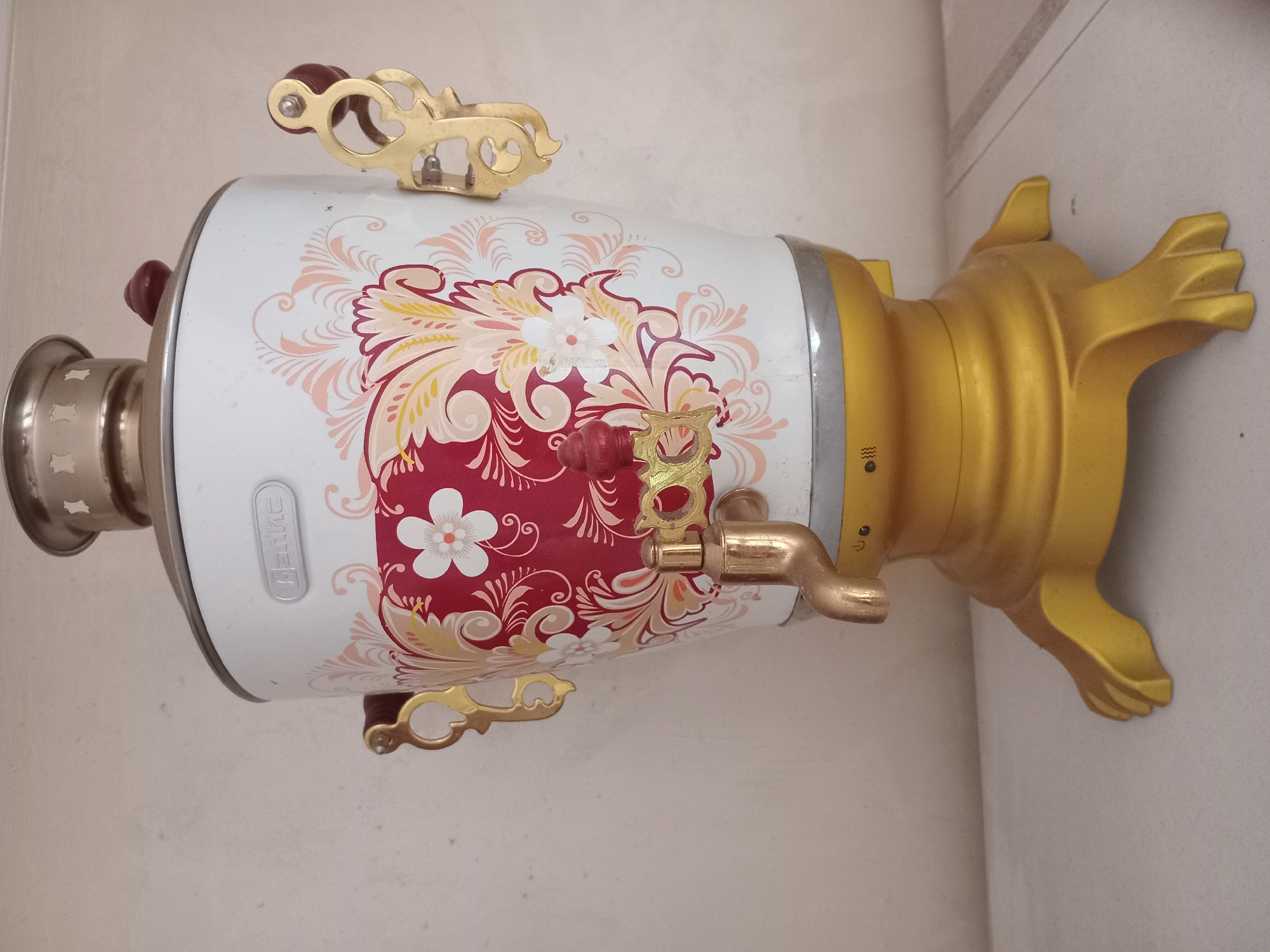 Folk art, ceramics, and collectibles photographed in a home setting