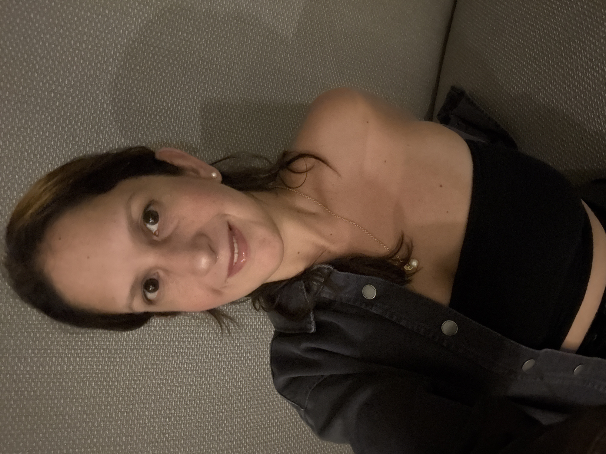 Woman photographed in couch and elevator scenes, San Isidro