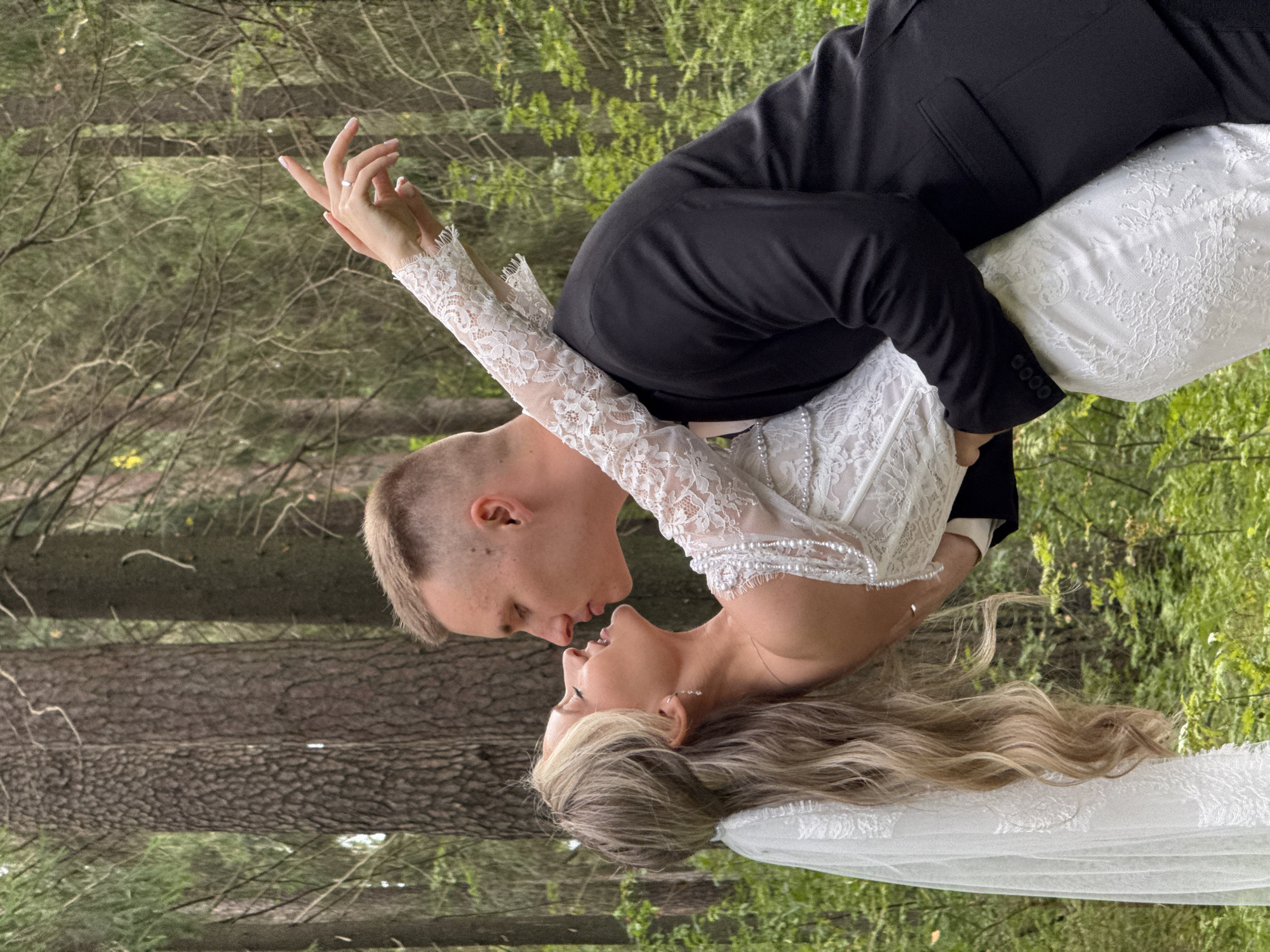 Wedding portraits in the forest outside Chaikovsky, Russia