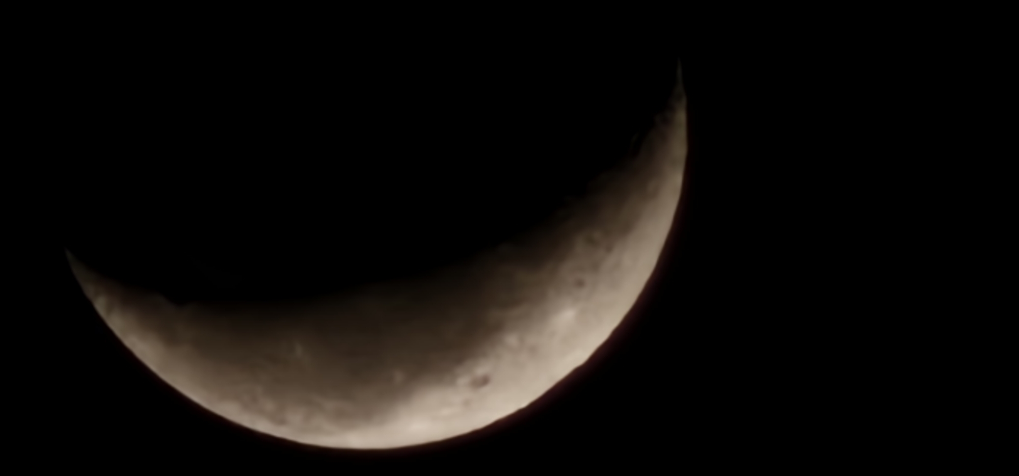 Crescent moon observed over Leudelange, Luxembourg early Tuesday morning