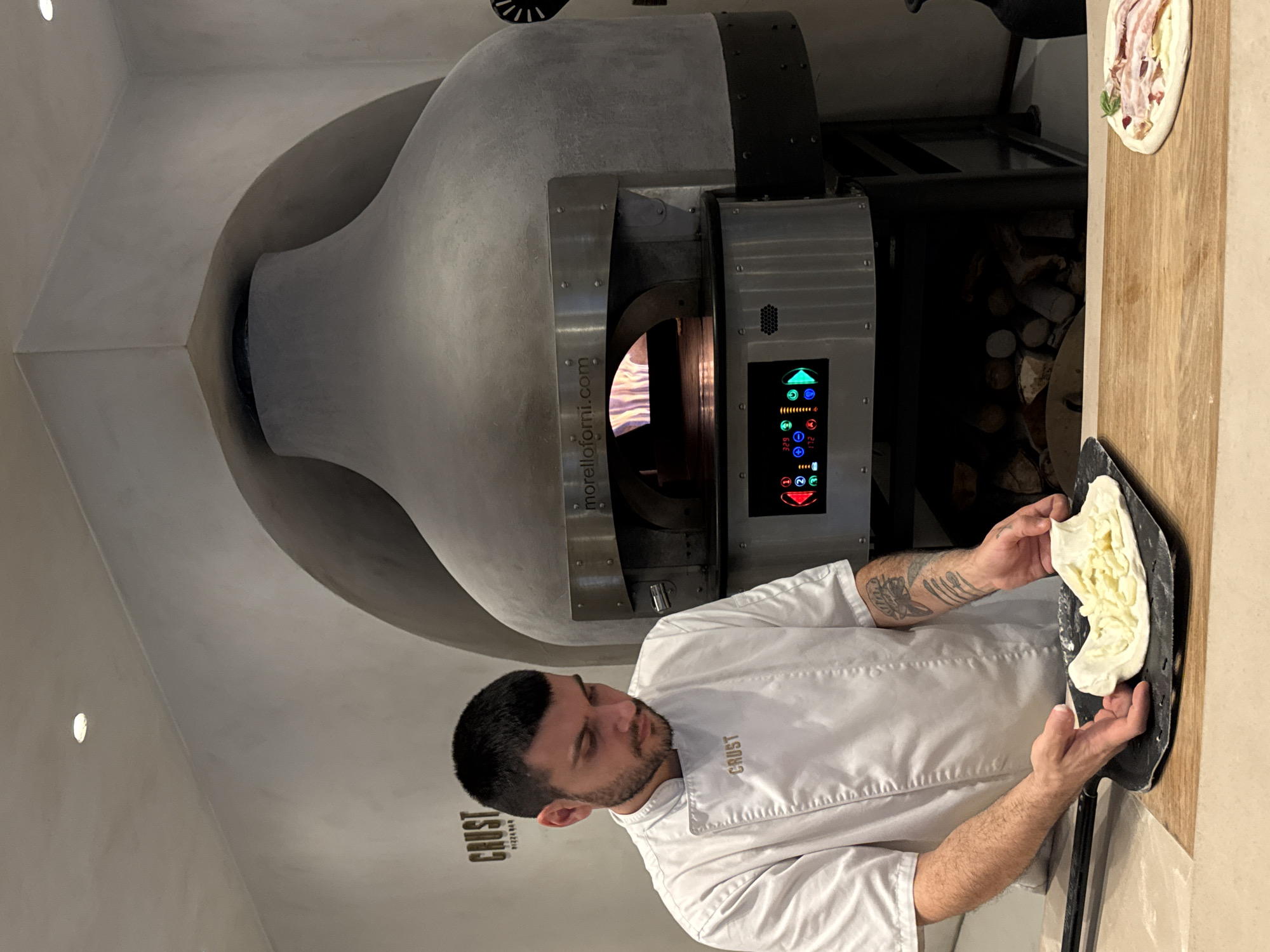 Pizza prep in full flow at Crust, Belgrade