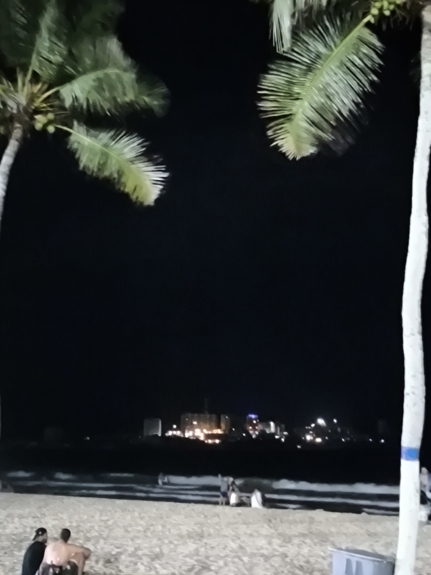 Evening beach activities and urban scenes documented in Pampatar