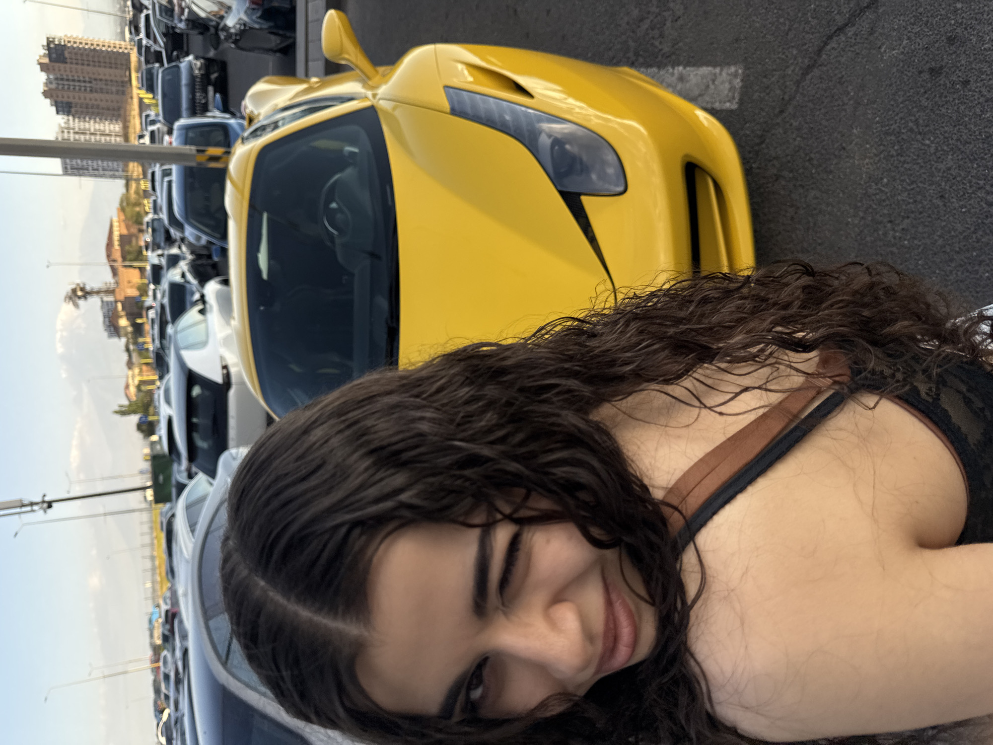 Yellow Ferrari turns heads in a Yerevan parking lot