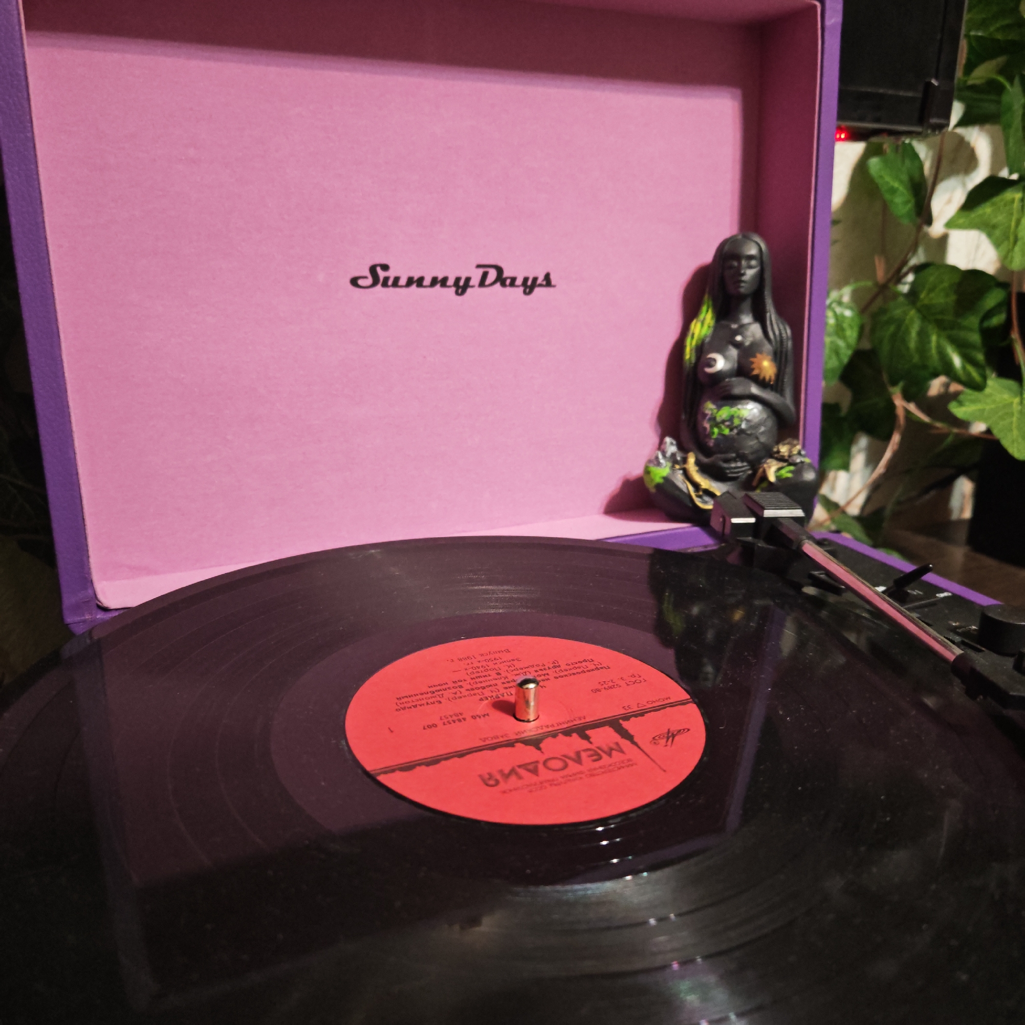 Vinyl record plays on portable player in Kladovitsy, Russia