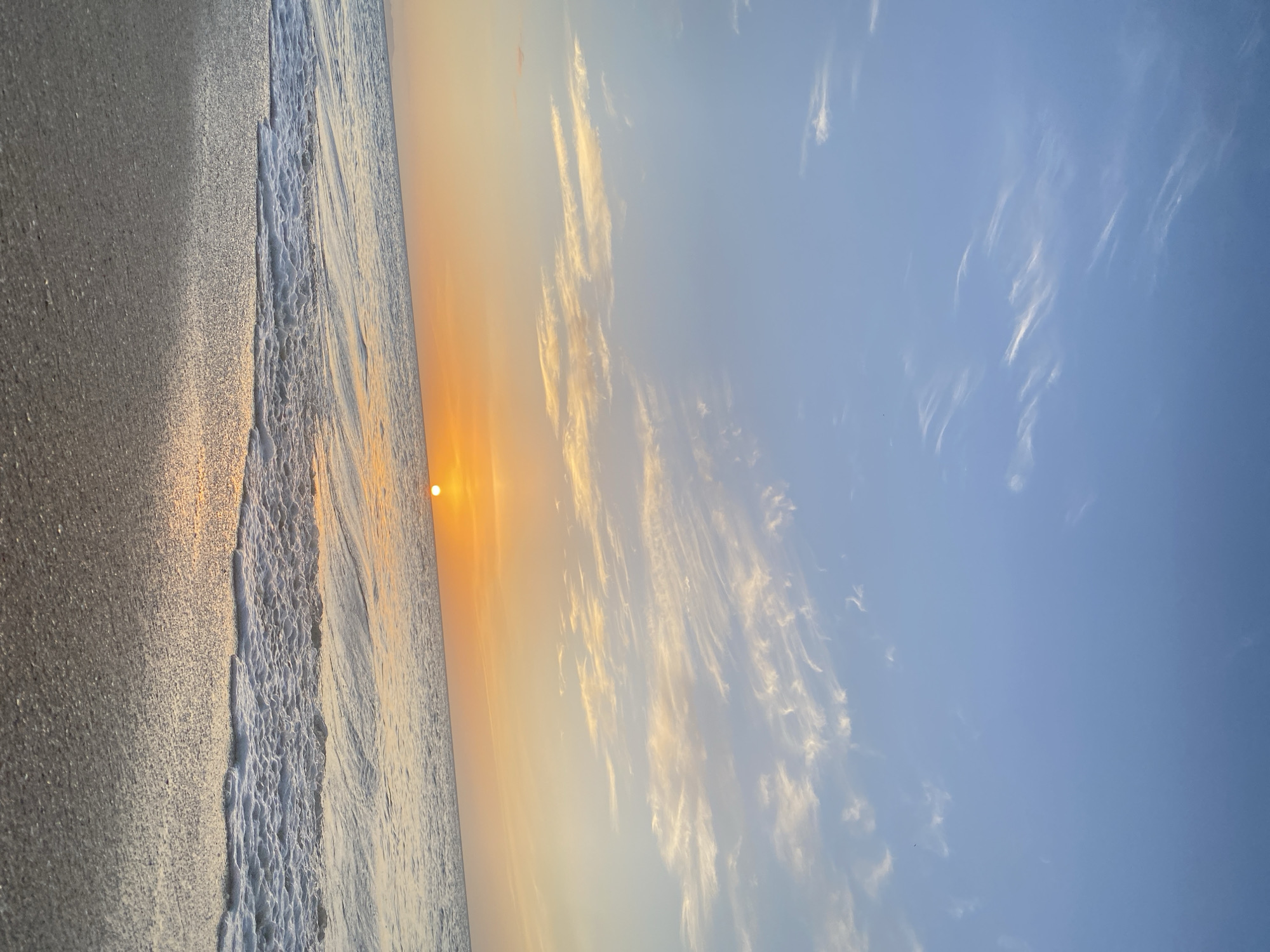 Sunset gathering at Juan Griego beach, Venezuela