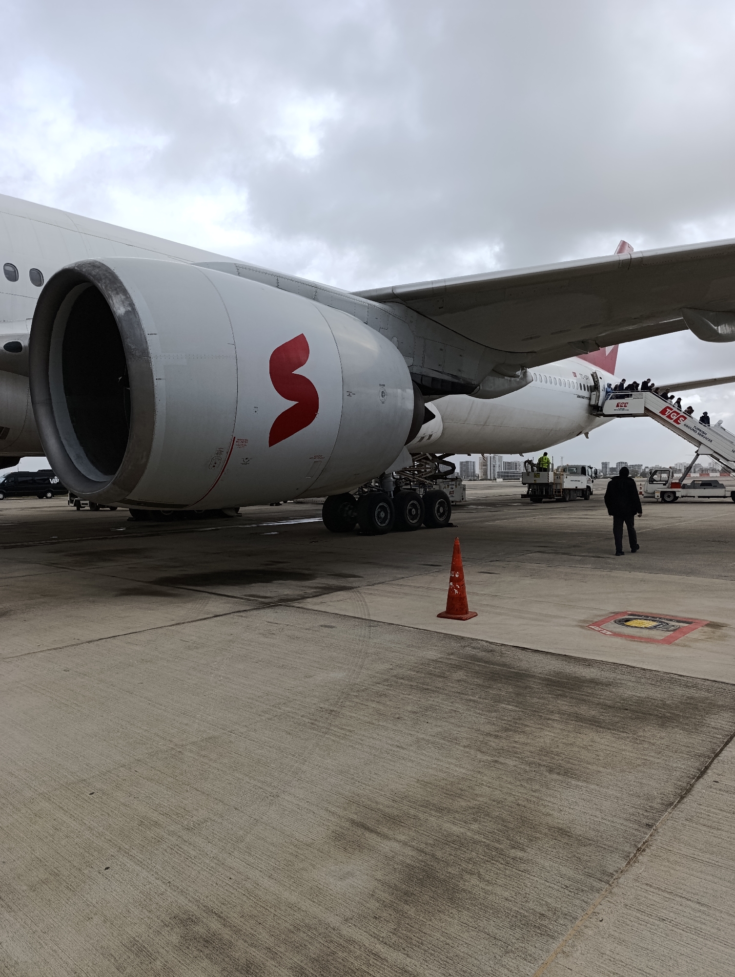 Commercial aircraft arrival and passenger disembarkation at Antalya Airport