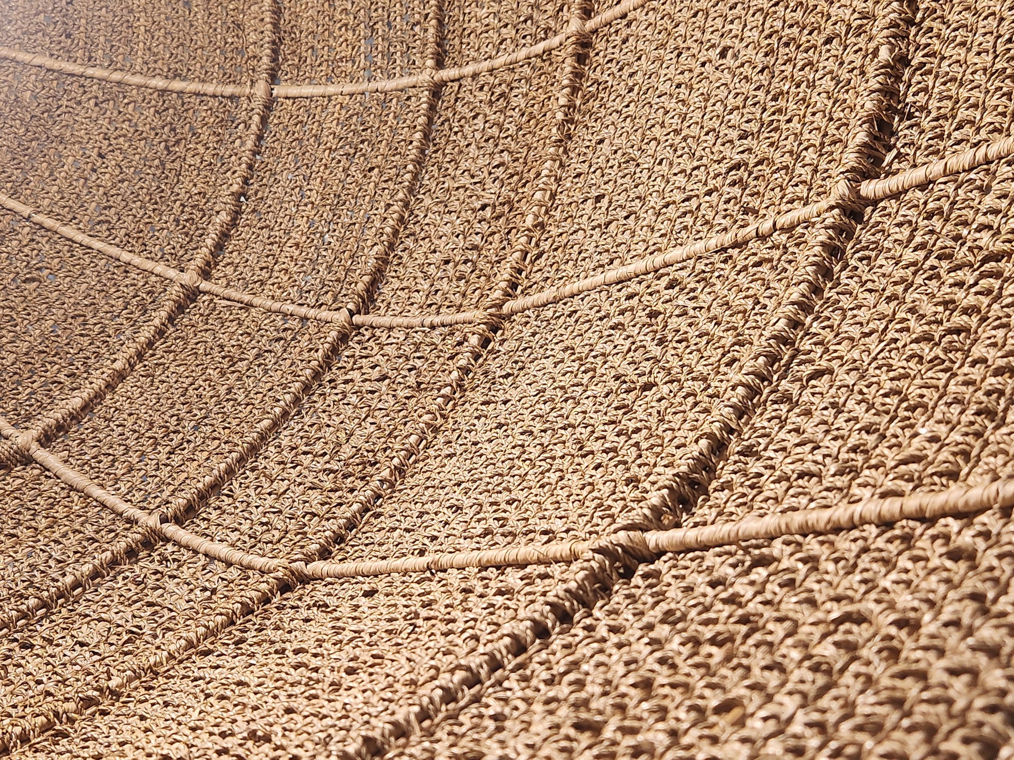 Browsing handcrafted masks, baskets, and woven decor in Maitland