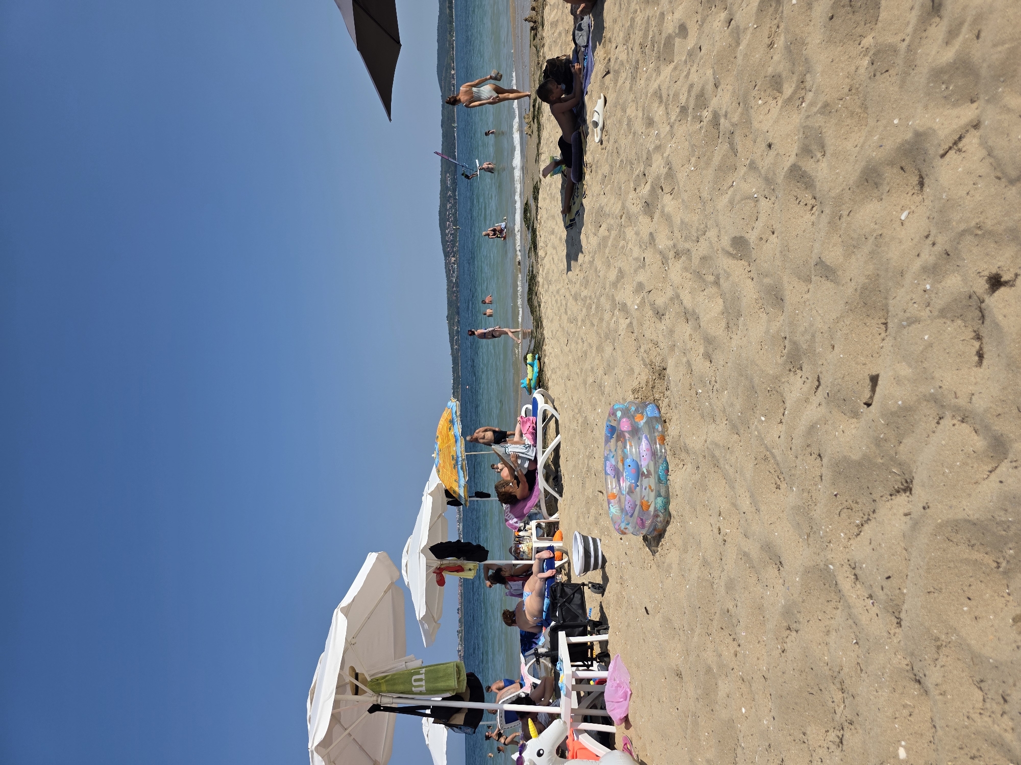 Crowded summer beach day on the Bulgarian Black Sea coast