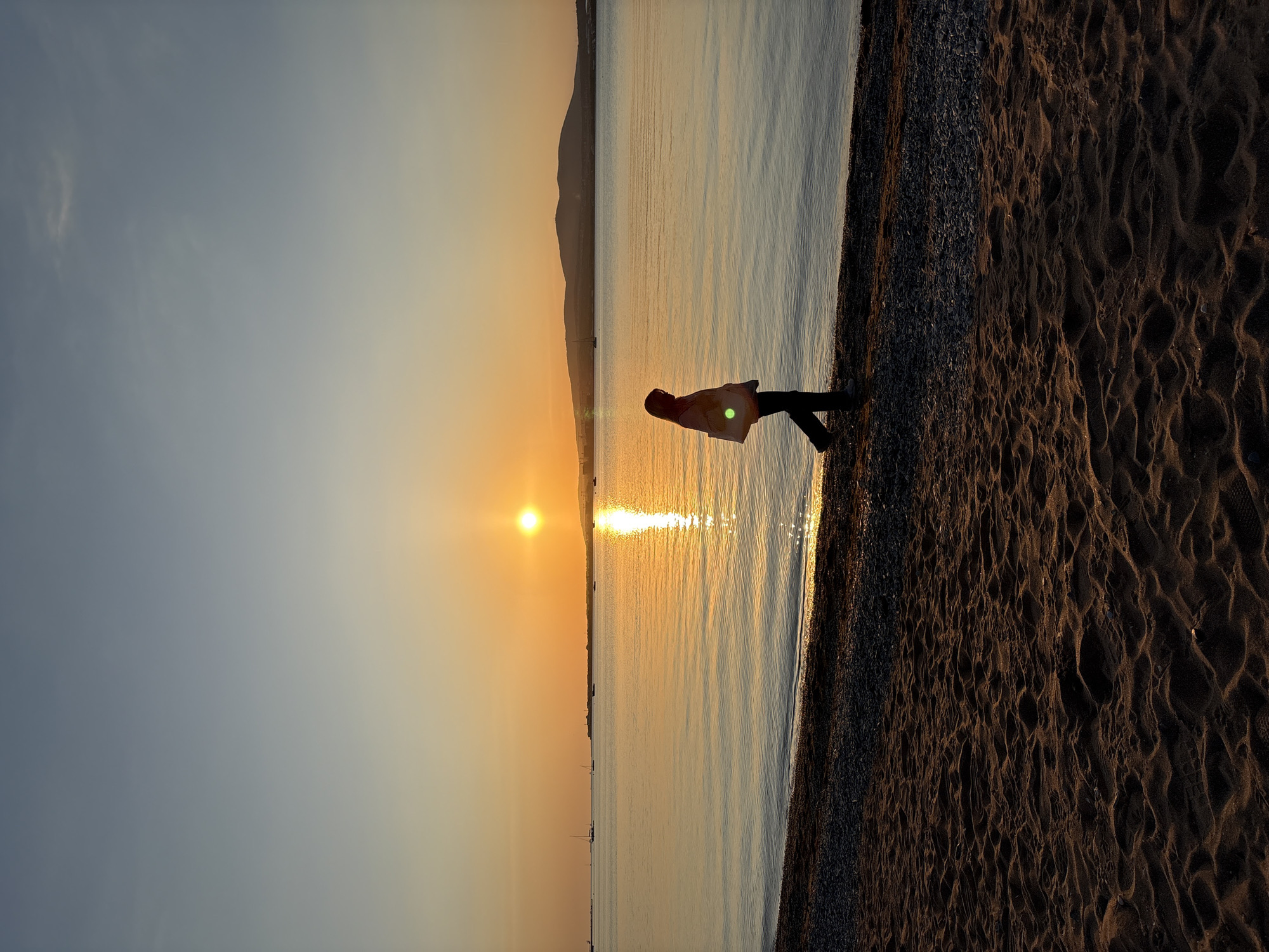 Golden hour sunset draws observers to Gelendzhik beach