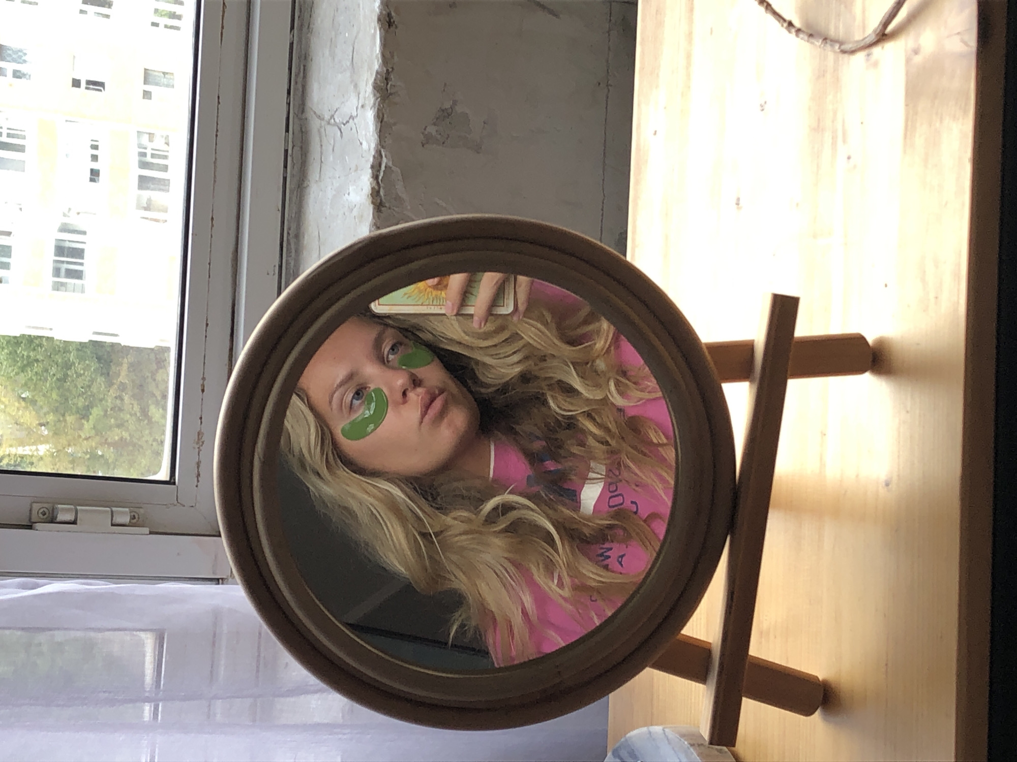 Mirror selfie with a Sun tarot card in Khimki