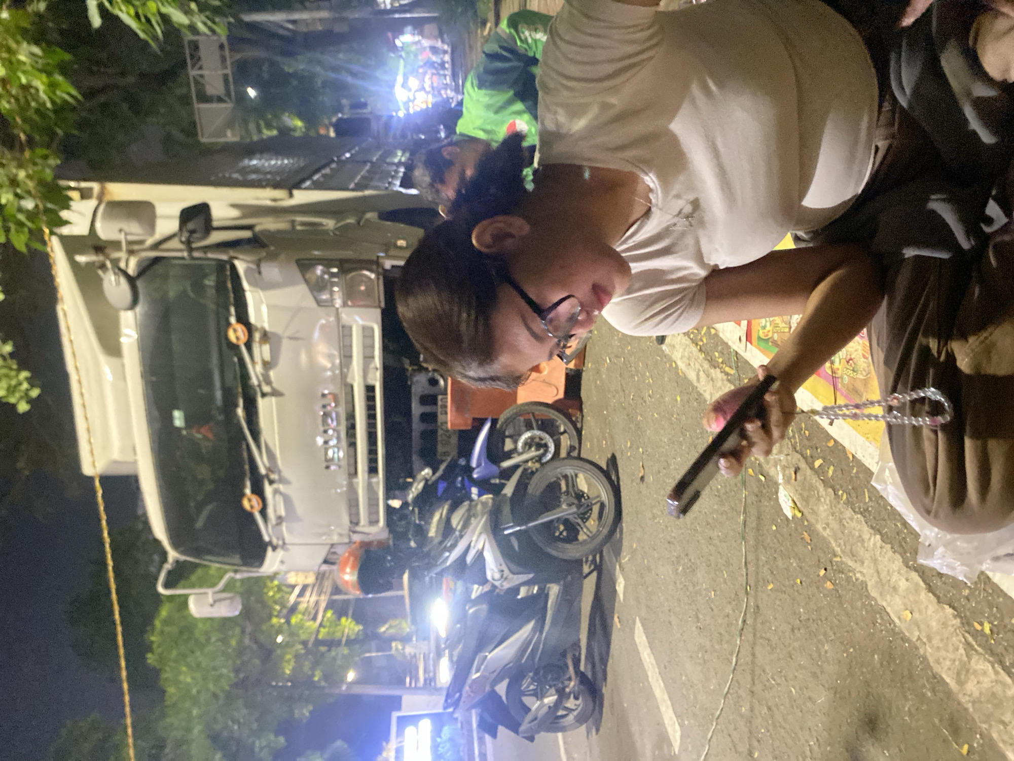 Late-night street food cart serving customers in Tangerang