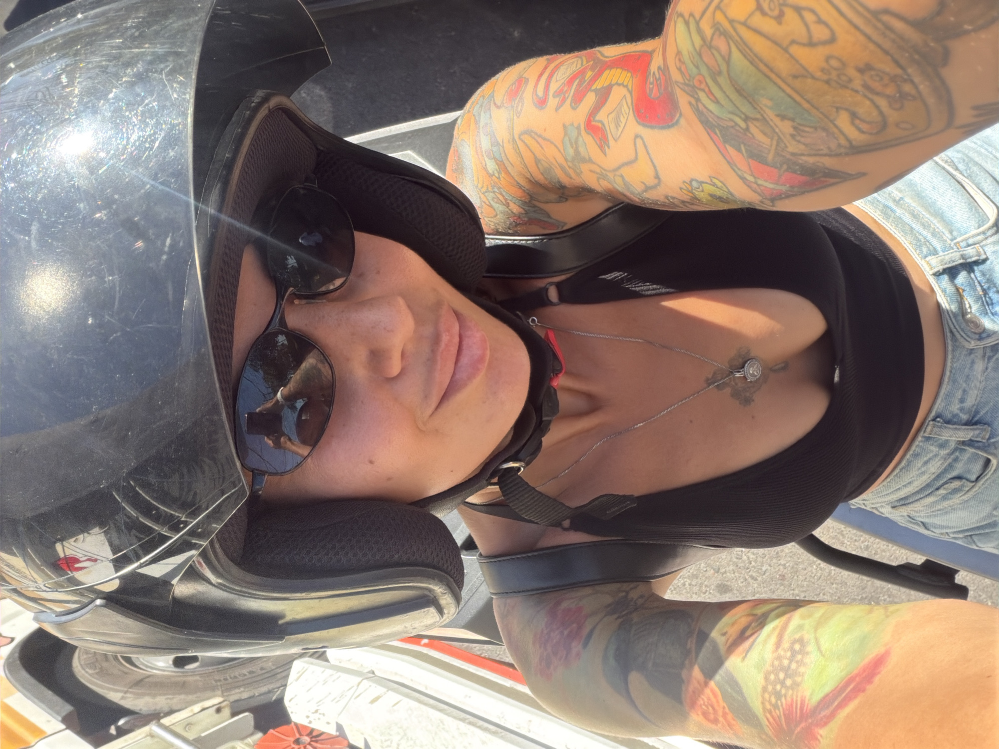 Scooter selfie session on a sunny Kuta Selatan road