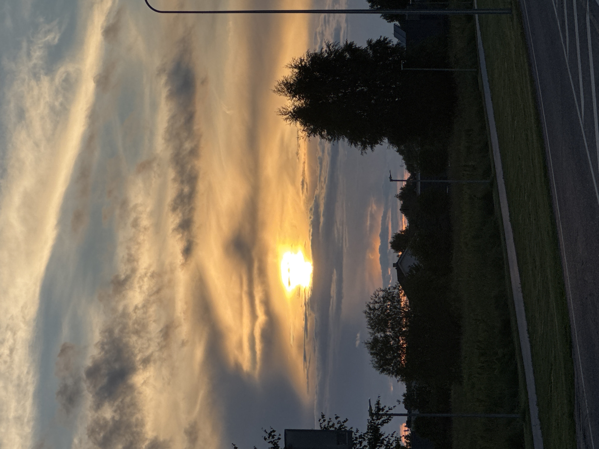 Warm sunset colors over Tallinn's suburban skyline